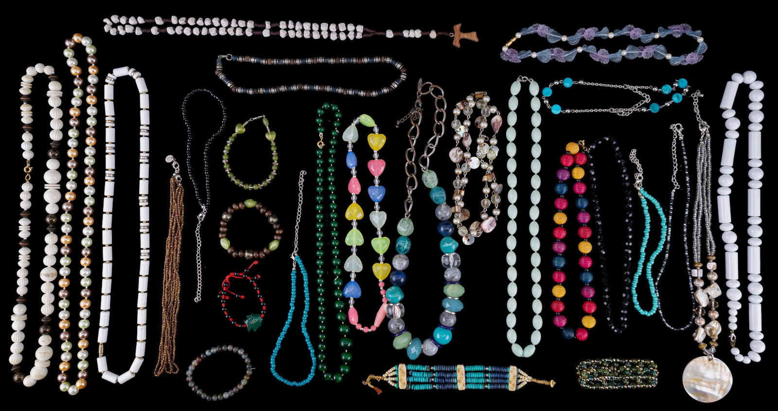 Beaded Costume Jewelry, Stone, Glass, Plastic: Large grouping of vintage beaded costume jewelry necklaces and some bracelets with stone, faceted glass, crystal, plastic, MOP, bone and other materials used.