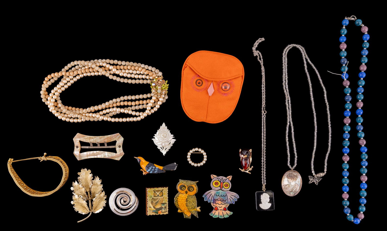 Vintage Jewelry: Includes gold tone bracelet, a owl brooch, Stone and pearl necklaces and a 1960's canvas owl pouch.