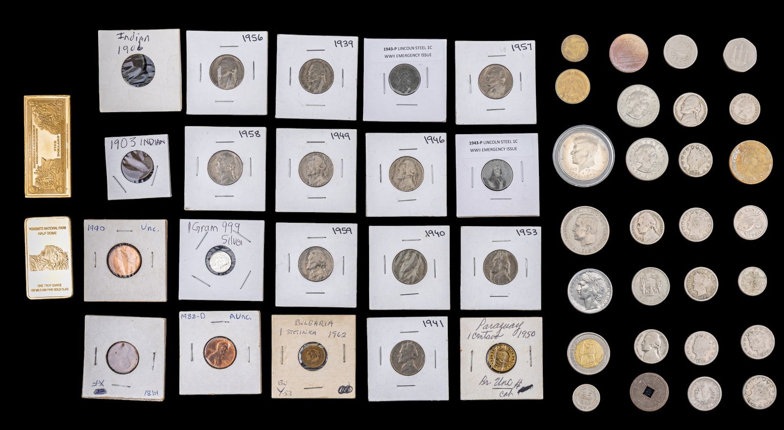 Coins and Clad Gold Bar Collection: A 1-ounce gold-clad bar featuring the endangered timber wolf design, marked .999 24k Gold 100 Mils Fine Gold Clad; a one-troy-ounce .999 copper bar with a five-dollar denomination design; a one-gram