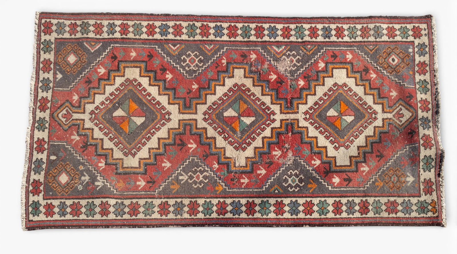 Antique Bakhtiari Area Rug: Antique Bakhtiari area rug with red, green, and beige tones with geometric designs. Measures approx. 7'6" x 4'1".