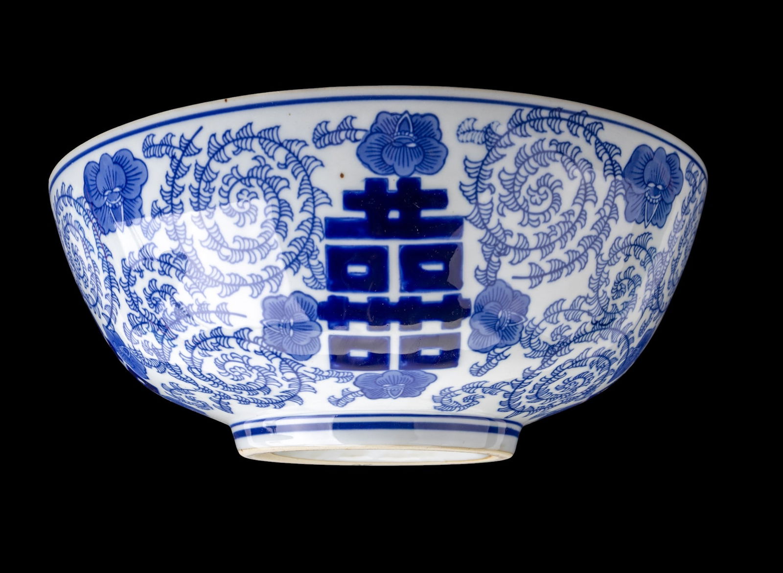 Chinese Blue & White Porcelain Bowl: Chinese blue and white porcelain bowl decorated with auspicious Shuangxi (Double Happiness) characters. Measures approx. 5.5" H x 13.75" diameter.