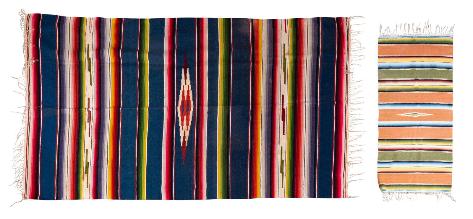 Early Woven Serape (3) Rugs / Mats / Textiles: Three hand woven serape including a runner with orange ground and blue gradients, approx. 44" L x 21" W, a wool Mexican serape with dark blue ground and red/pink gradients, approx. 50" W 64" L, and a