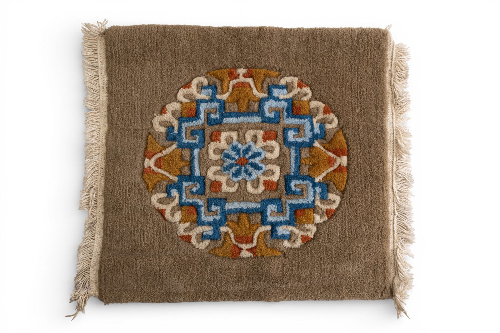 Chinese Wool Hand Knotted Medallion Rug: A Chinese wool hand knotted medallion rug with fringe featuring a tan, blue, and orange motif, measures approx. 1'5" W x 1'8" L.