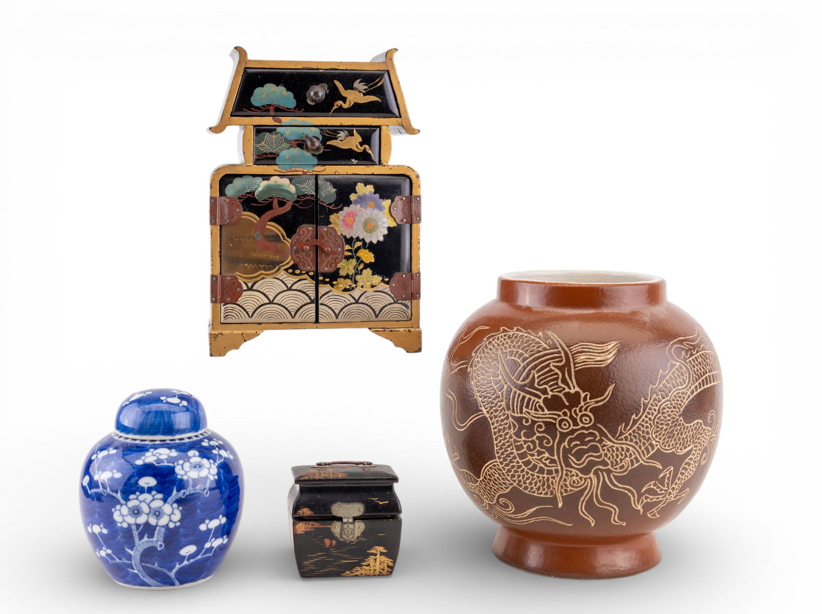 Asian Porcelain & Wood Decoratives, Perfume Caddy: Includes an early japanned perfume caddy measuring approx. 2.5" x 2.5" x 1.75", a miniature japanned dresser with painted scene measuring approx. 8" x 5.5" x 3", a blue & white blue glaze ginger jar,