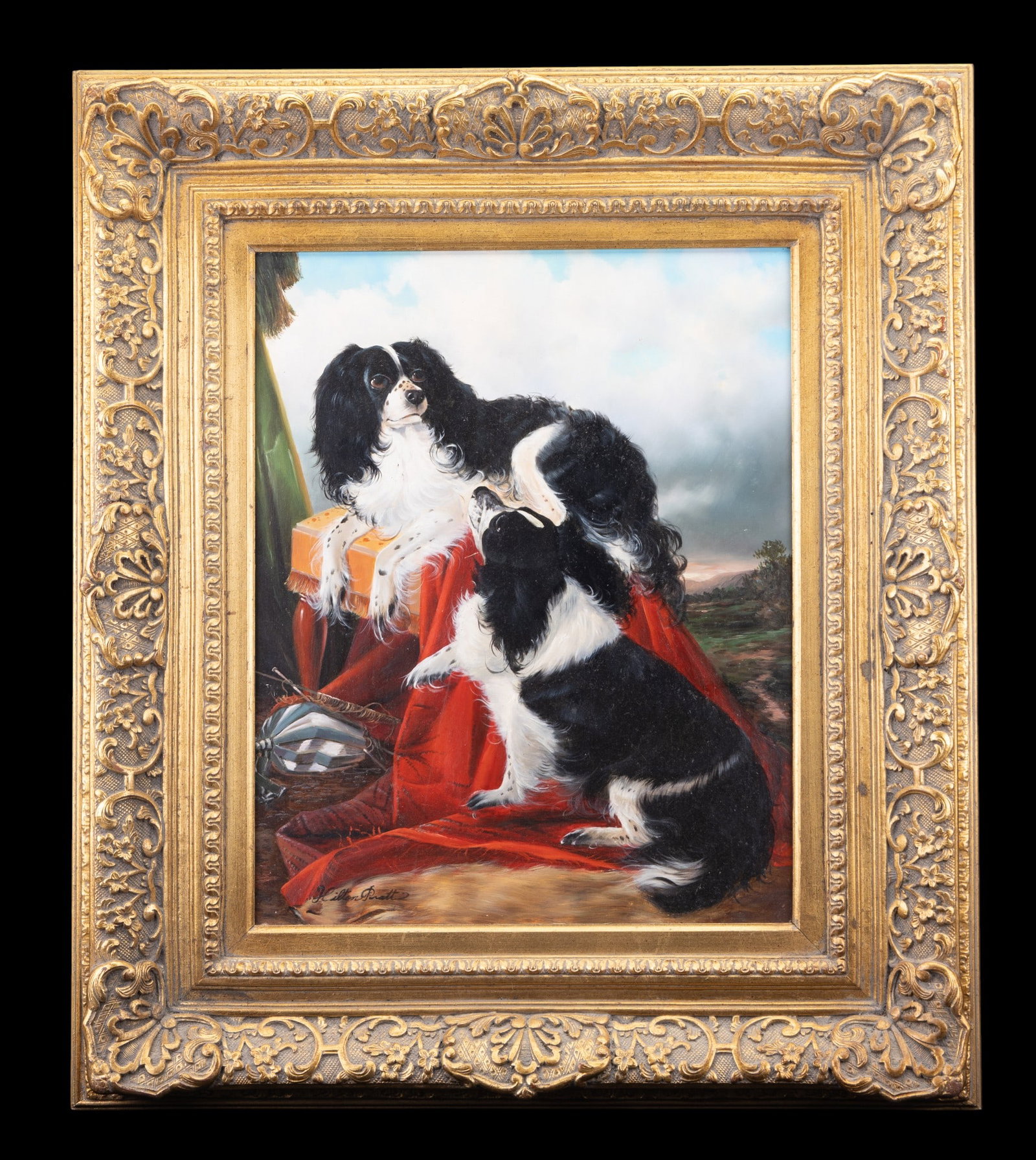 Hilton Pratt Oil on Board, Spaniel Dogs: Oil on board painting by Hilton Pratt depicting 2 black-and-white spaniel dogs posed in an outdoor setting with draped red fabric and landscape beyond. Presented in an ornate gilt frame. Signed lower