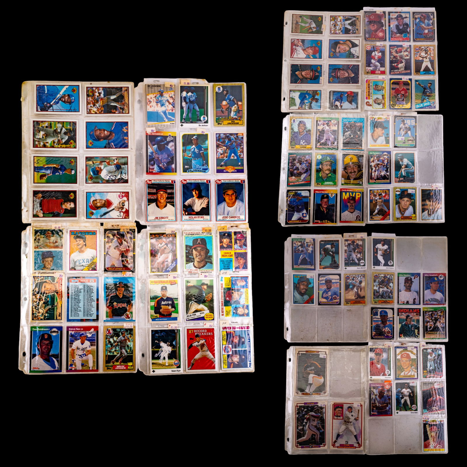 MLB Trading Cards: A collection of vintage MLB trading cards featuring brands such as Fleer, Topps, Donruss, and Upper Deck.
