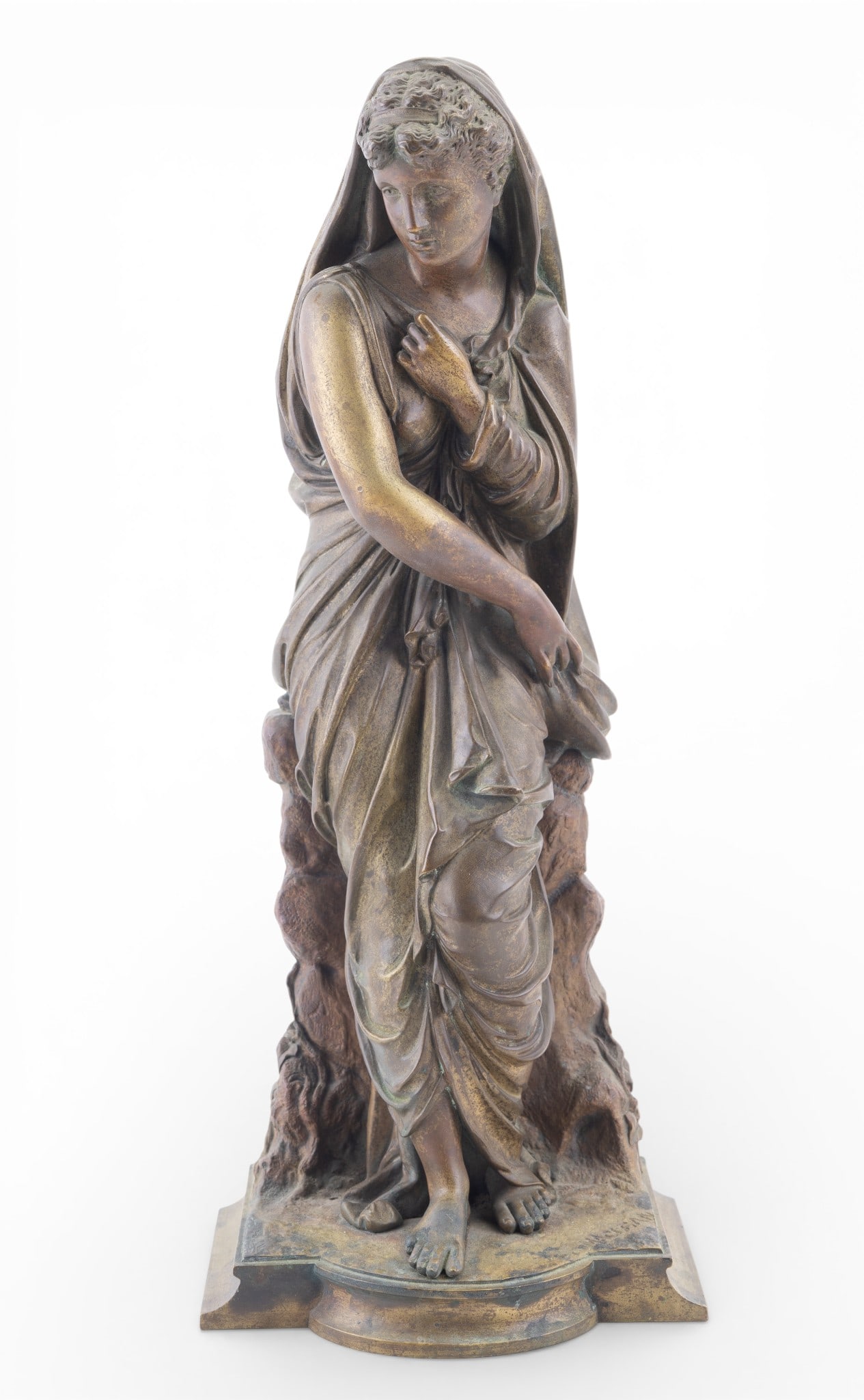 Bronze Figural Sculpture of a Woman, Maclean: Bronze figural sculpture depicting a draped classical woman in a contemplative pose, leaning against a naturalistic wall form. Measures approx. 14.5" H x 6" W. Signed "MACLEAN".