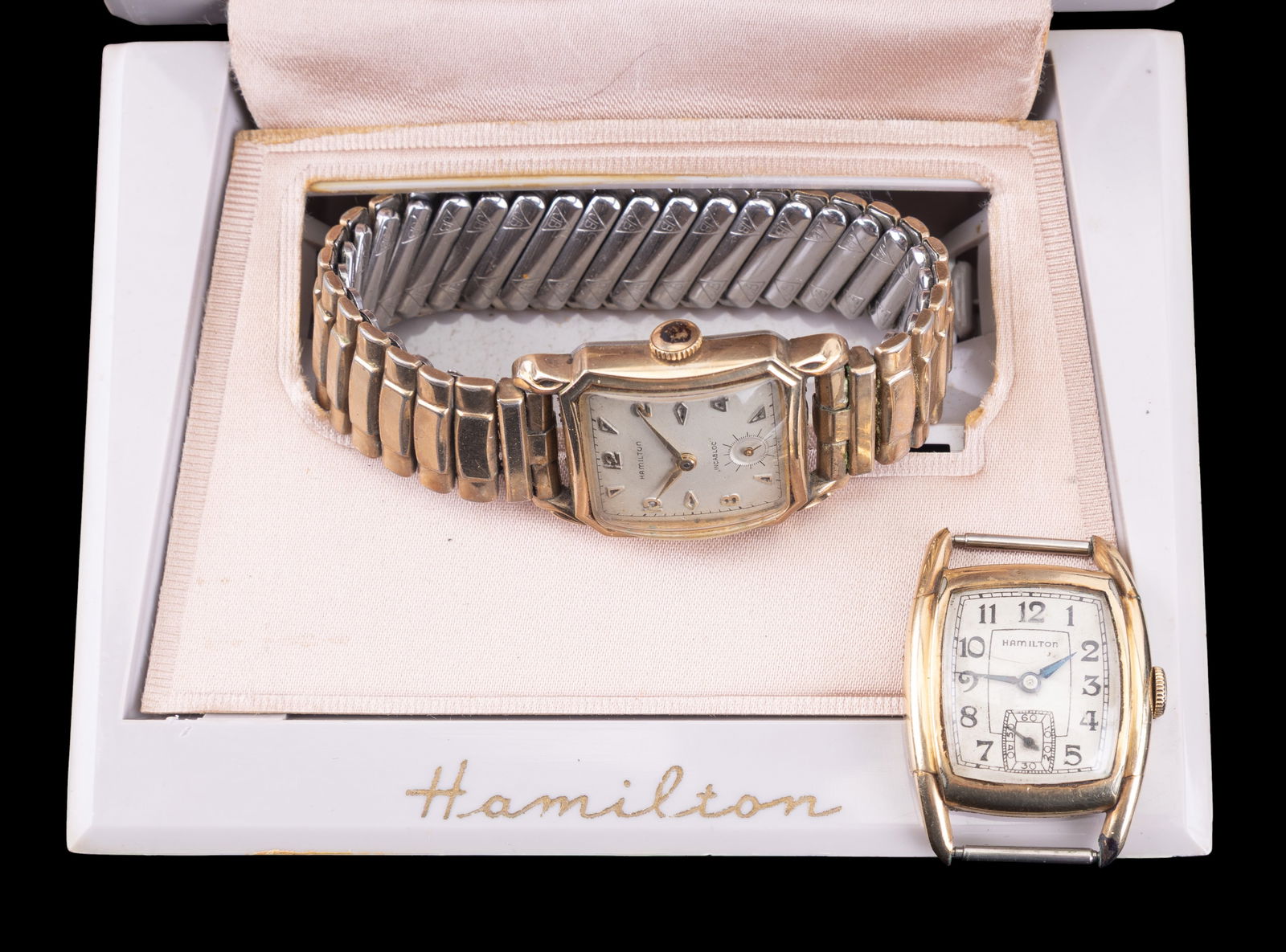 Vintage Hamilton Wrist Watch Movements: A vintage Hamilton 17 jewel wrist watch movement #0196188 in a Wadsworth 10K GF bezel case #H535834 and a vintage Hamilton Illinois Watch Co 17 jewel movement in a 10K RGP bezel #S936620, and plastic