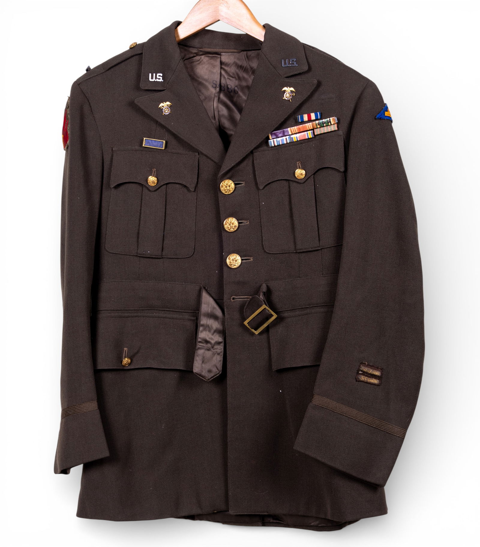 WW2 Era U.S. Army Dress Jacket and Cap: A WW2 United States Army dress jacket with ribbons, medal, and the insignia of the 7th Army on the left shoulder, 63rd infantry insignia on the right, with cap and 63rd Infantry insignia included. Jac