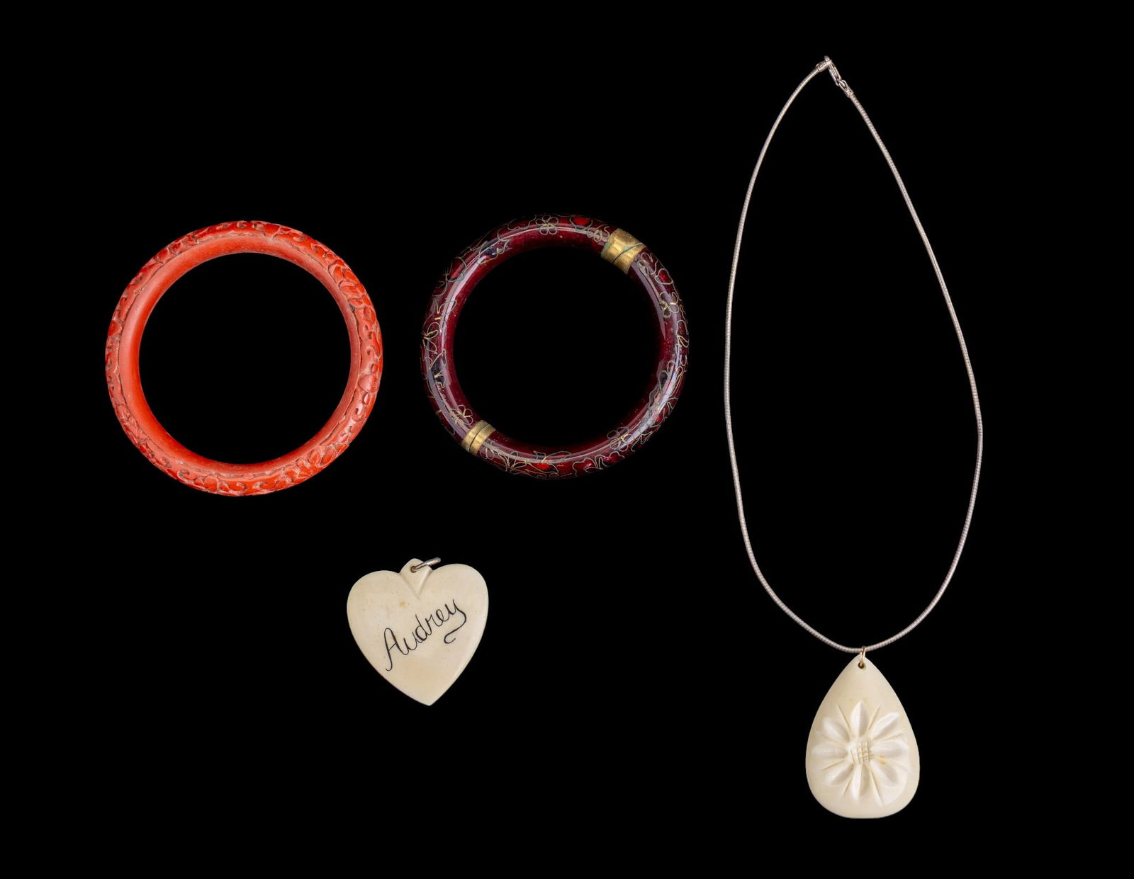 Cinnabar, Cloisonne, 925, Natural Material Jewelry: A cinnabar bangle bracelet, a hinged cloisonne bracelet, a natural material pendant in a teardrop shape with carved flower, a heart shaped personalized natural material pendant, and a sterling silver