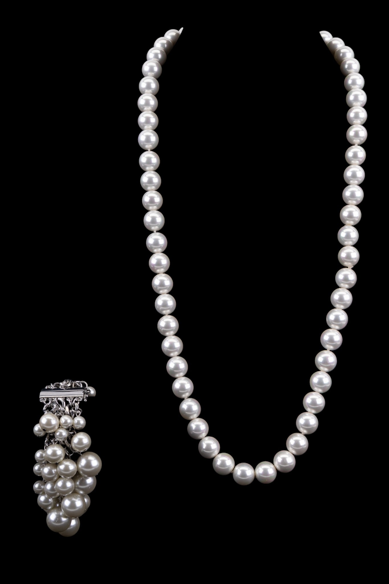 Oversized Faux Pearl Jewelry: Oversized faux pearl necklace strand and a chunky style oversized faux pearl silver tone bracelet with magnetic clasp.