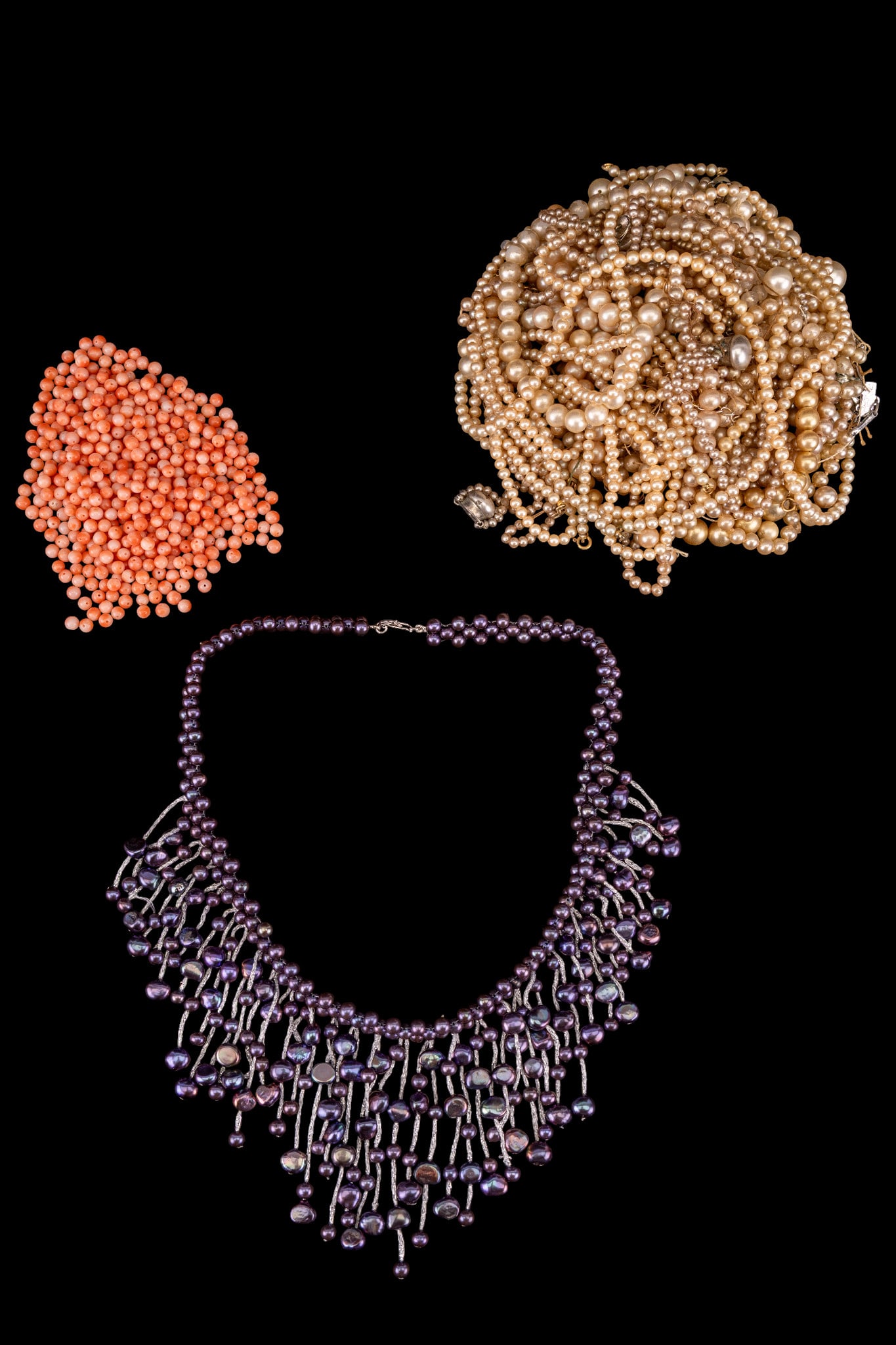 Cultured & Faux Pearl, Coral Jewelry Craft Beads: Collection of faux pearl beads, spherical polished coral beads, and black cultured pearl jewelry craft.