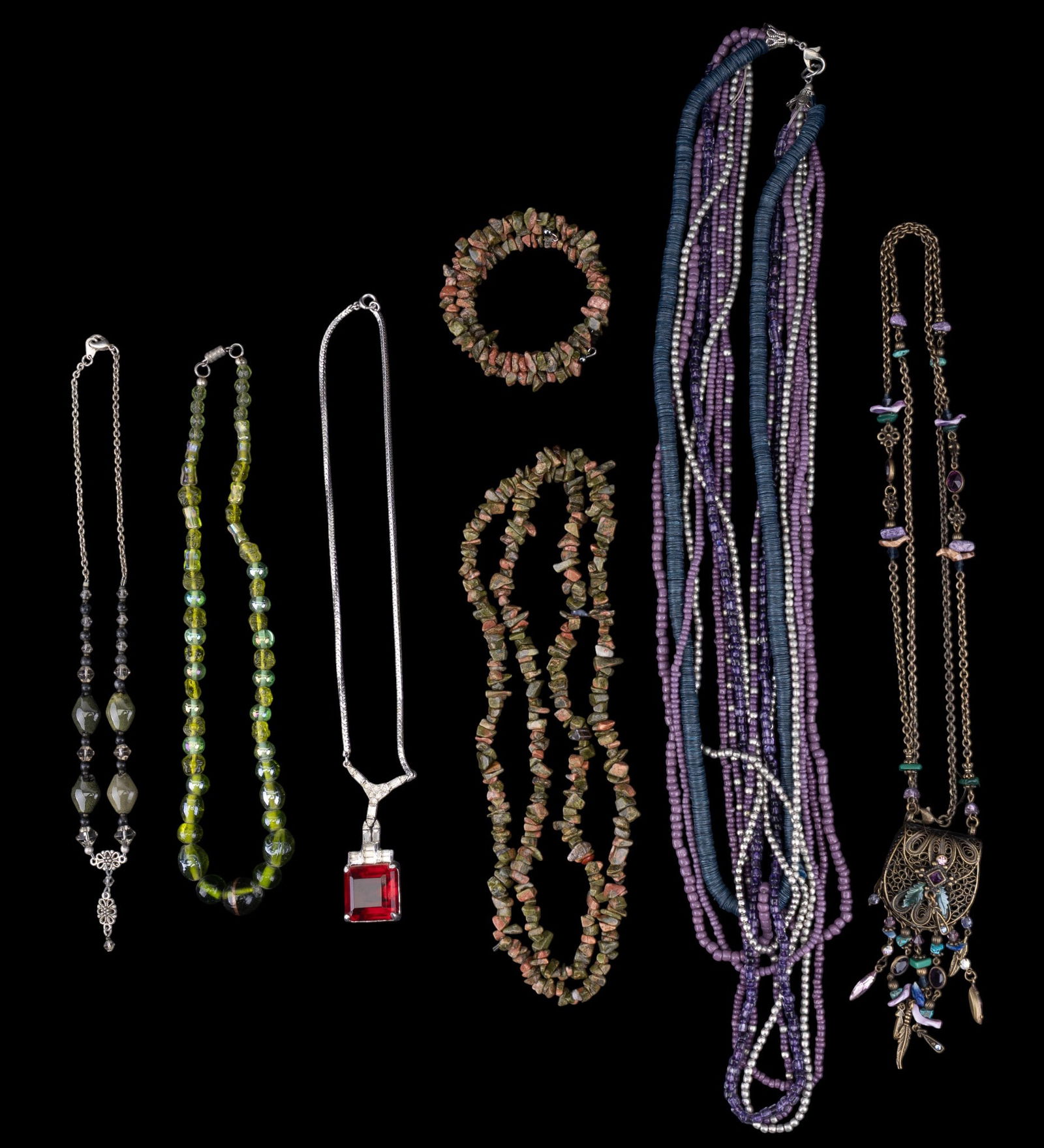 Beaded and Other Costume Jewelry: A necklace and wrap bracelet made of unakite chunks, a vintage filigree fetish style neckalce by Sweet Roamnce, vintage green carnival glass graduated bead necklace, and more.