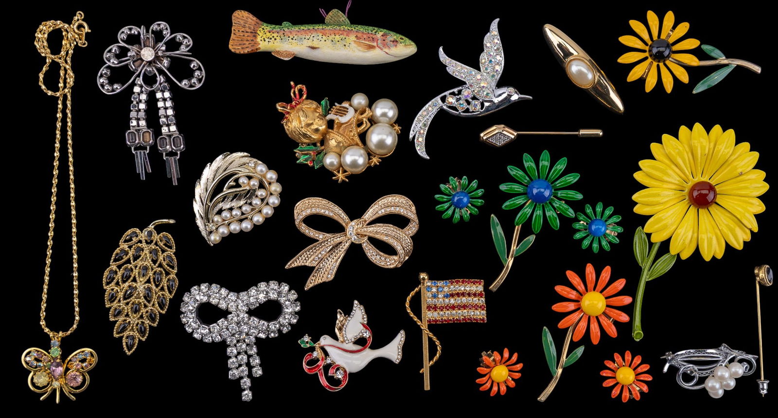 Vintage Estate Brooches and More: A collection of vintage estate brooches including enamel flower brooch and clip on earring sets, a silver tone 12K GF rhinestone brooch, a carnival rhinestone bird by Sarah Coventry, a Christmas dove