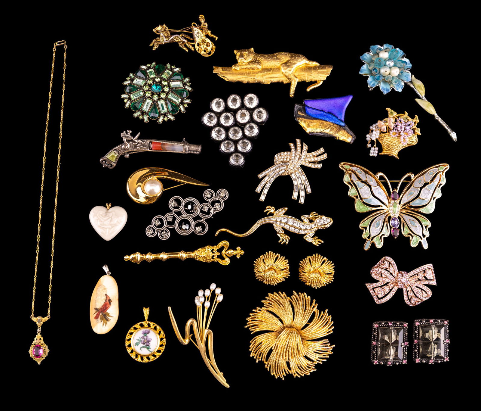 Vintage Designer Costume Jewelry: A collection of vintage designer costume jewelry including brooches by Jonette Jewelry, Bob Mackie, Coldwater Creek, Kenneth Jay Lane, a matching brooch and earring set by Monet, a porcelain Hutschenr