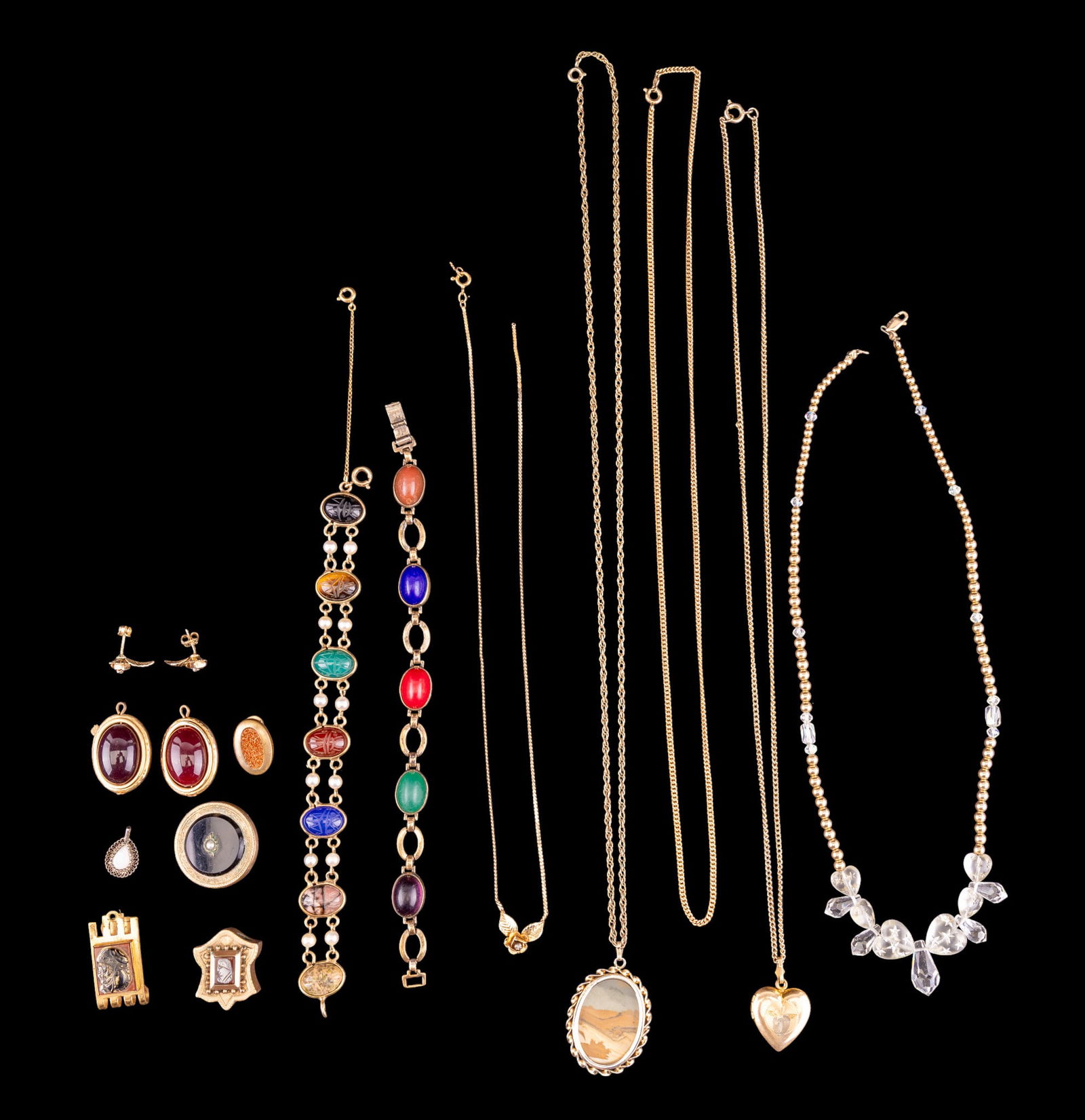 Early and Vintage Gold Filled Jewelry: A collection of gold filled jewelry including 12K GF scarab bracelet, a banded agate oval pendant with 12K GF frame, a Victorian onyx pendant, a pair of rose stud earrings and matching necklace featur