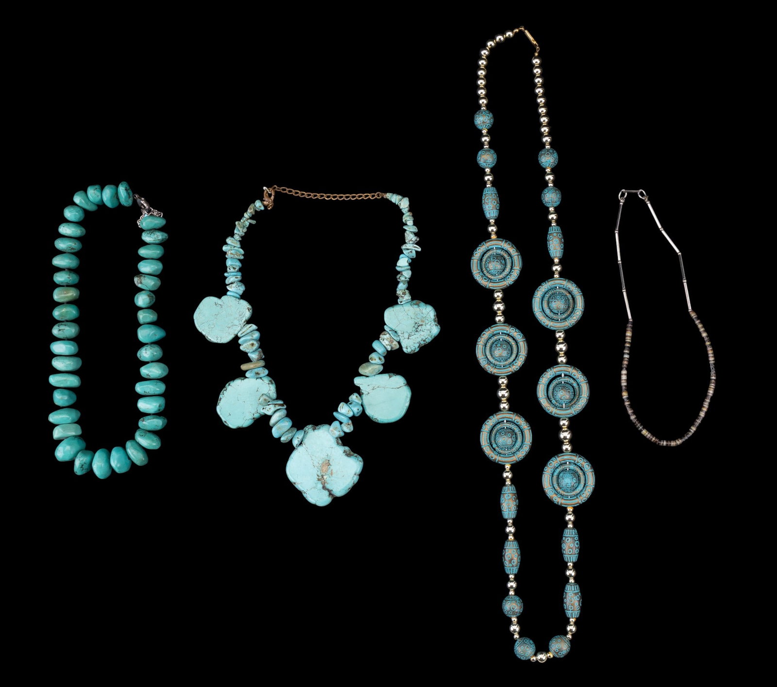 Turquoise and Sterling Jewelry: A smooth chunk turquoise necklace with sterling clasp, a smooth turquoise chunk station necklace, a Hobe silver tone and shell disc bead necklace, and a composite turquoise and gold painted beaded cos