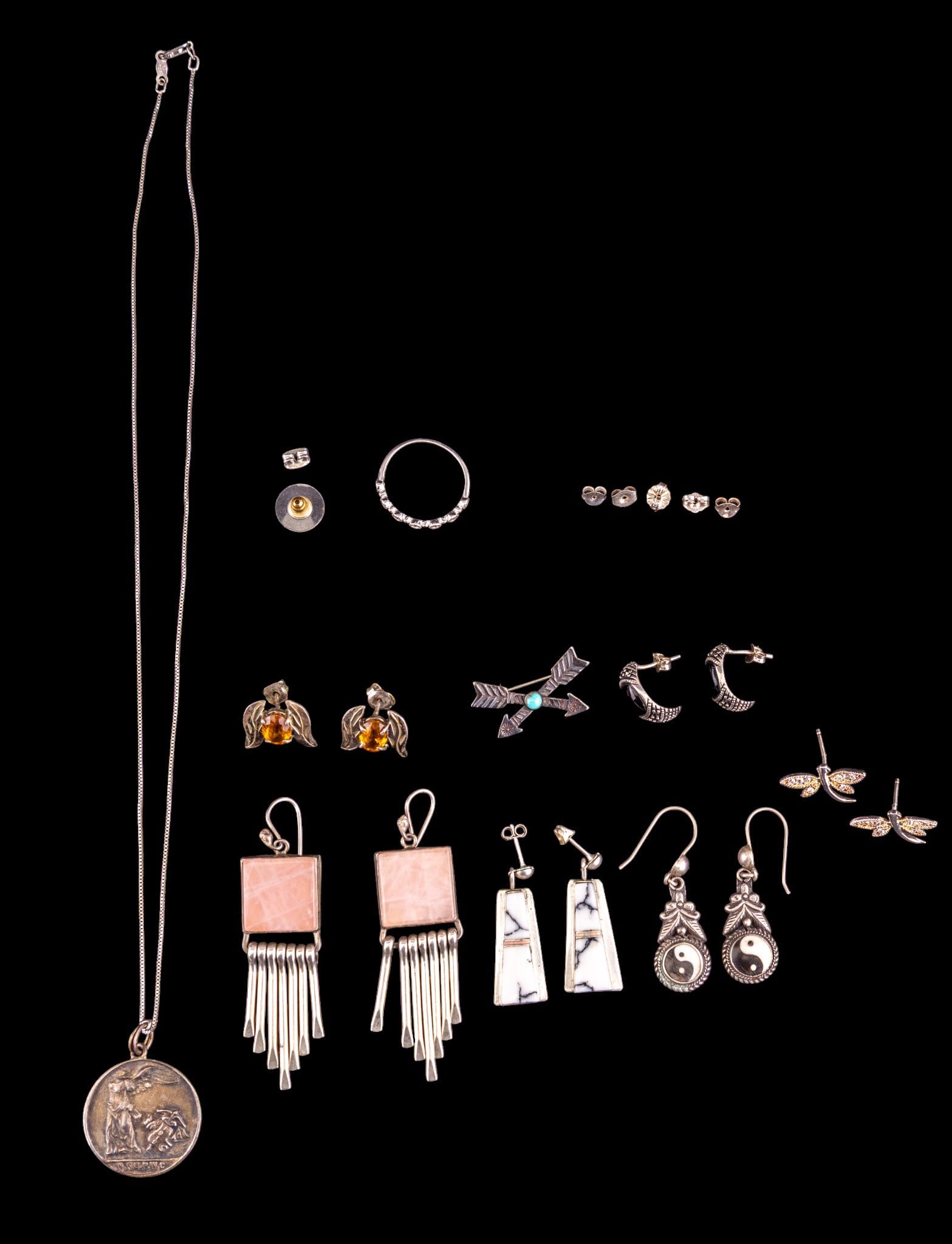 Sterling Silver Earrings and More: A collection of sterling silver jewelry including 6 pairs of earrings including French hook and rose quartz earrings with silver fringe, Native American style French hook Yin Yang earrings, rhinestone
