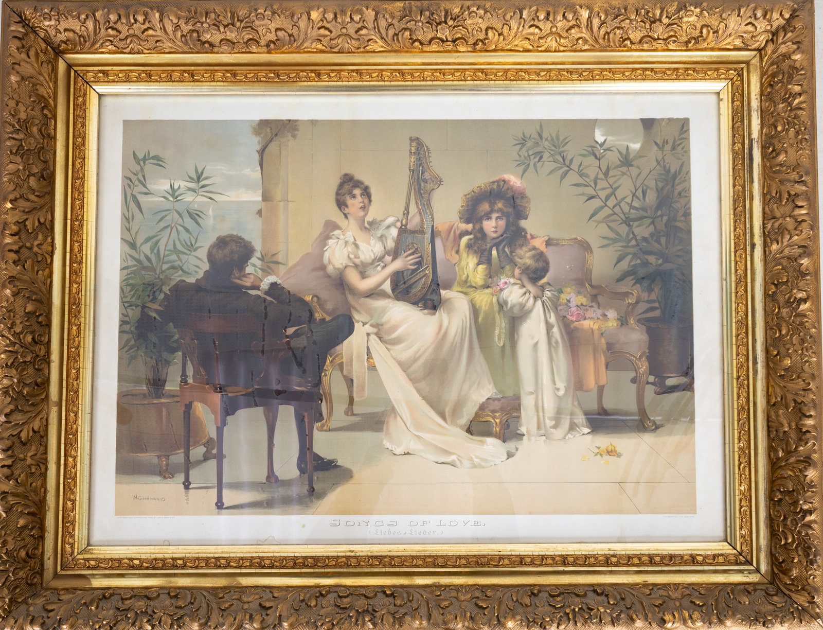 Framed Colored Lithograph, Songs of Love: Large colored lithograph titled Songs of Love, after M. Goodman published and copyrighted 1882 by Lautz Bros. & Co. The print depicts a Victorian interior scene with figures gathered around a harp in