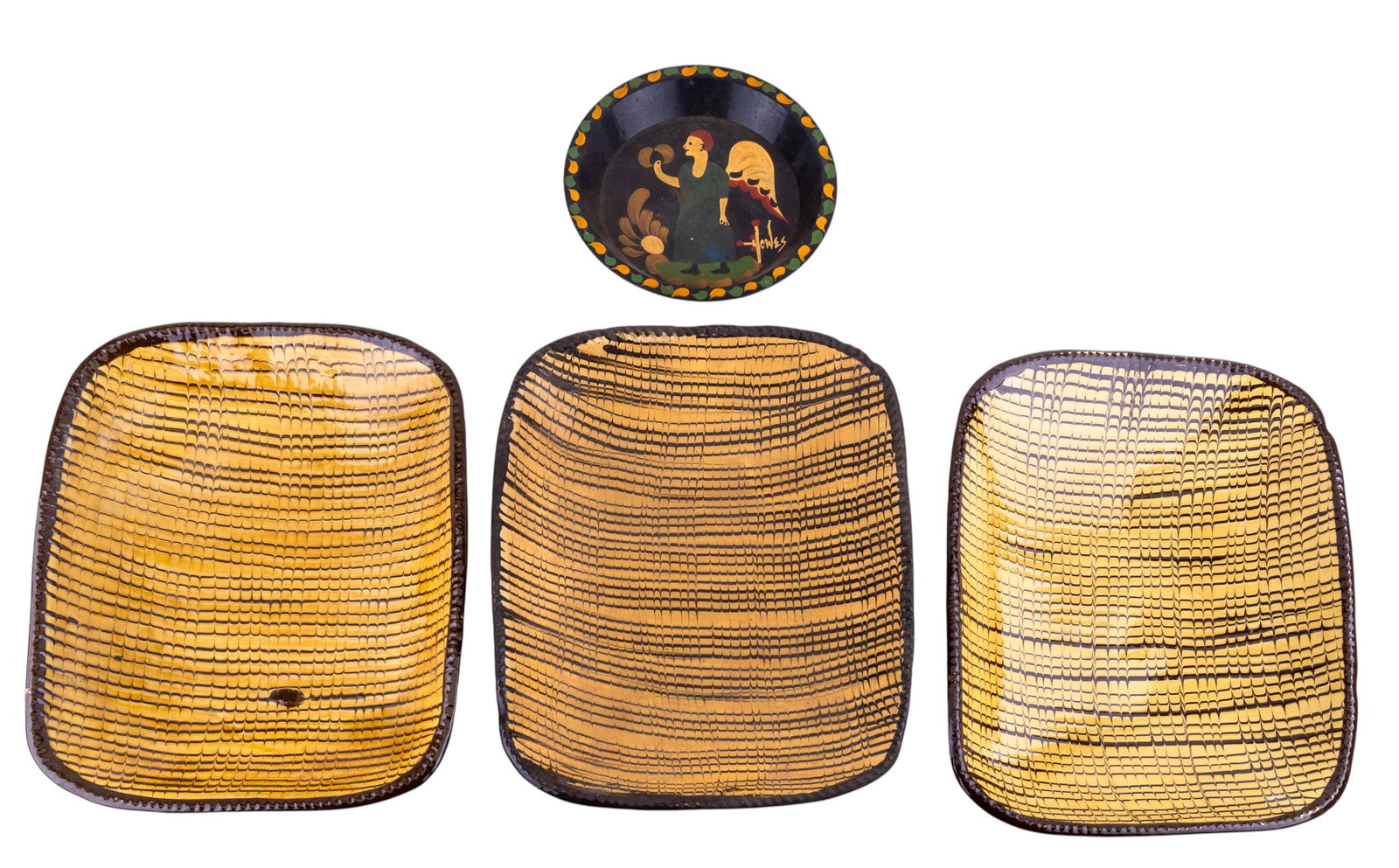 Colonial Williamsburg Slipware & PA Dutch Pan: A tole painted Pennsylvania Dutch decorative pie plate signed 'Howels', approx. 9" diam, and three large Colonial Williamsburg slipware/redware loaf plates, all measuring approx. 12.25" W x 16" L.