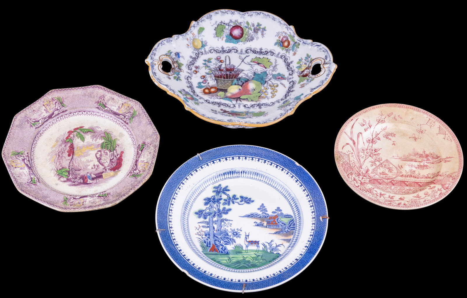 Staffordshire Porcelain Transferware: A collection of Staffordshire porcelain transferware including a 19th C C & W hand decorated Ailanthus purple transferware plate, approx. 9.25" diam, a hand decorated 'Lowestoft Deer' plate by Booths,