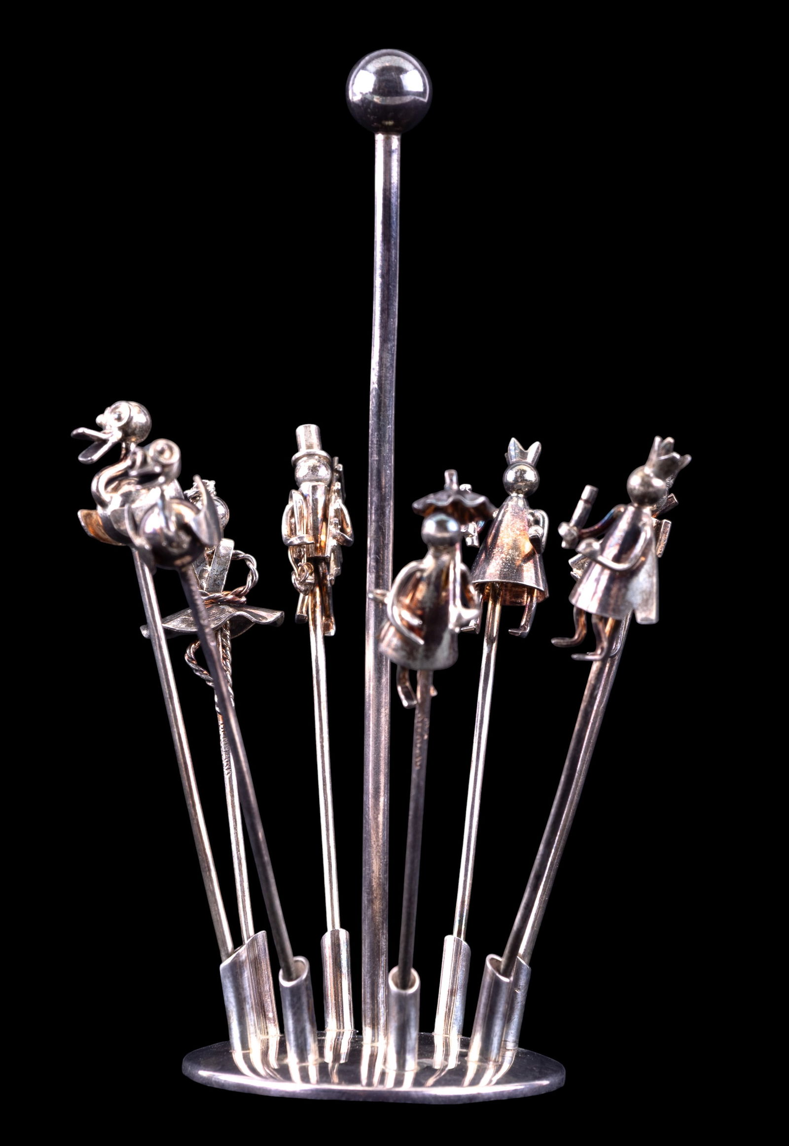 Danish 925 Silver Hors d'Oeuvre Stick Stand Rorvig: Figural sterling silver hors d'oeuvre stick stand weighing 1.70 ozt, marked 'Sterling Denmark' J. Rorvig. Features eight figurative sticks with detailed characters, including a king, a queen, a baller