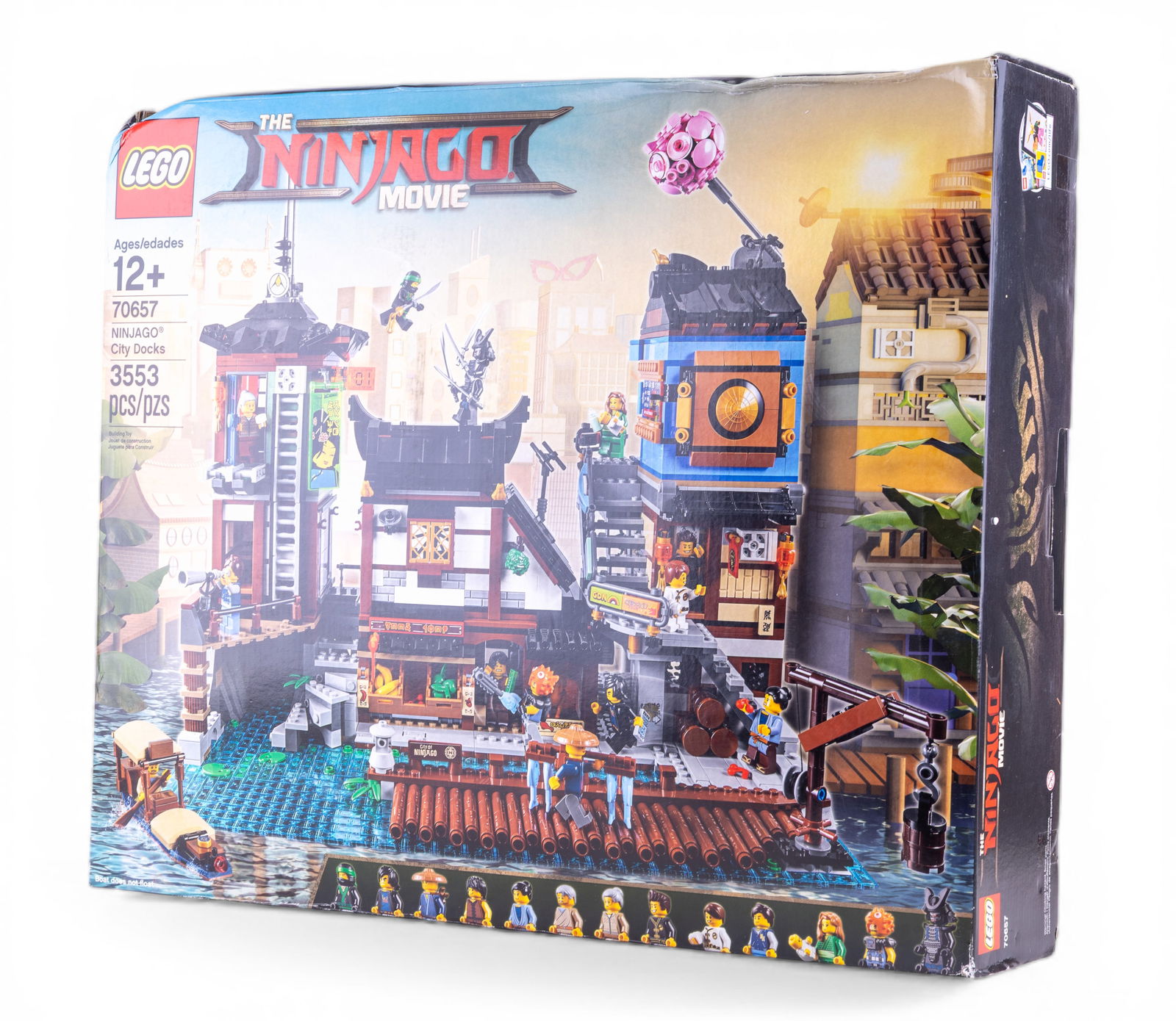 LEGO Ninjago Movie Set #70657, Sealed Box: LEGO Ninjago Movie Docks Set #70657, featuring 3,553 pieces and recommended for ages 12+. Includes multiple detailed structures and minifigures as depicted on the box. The kit remains factory sealed a