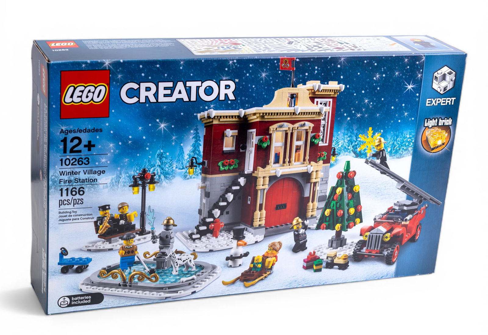 LEGO Creator Winter Village Fire Station 10263: LEGO Creator Winter Village Fire Station set (10263), NIB (New In Box). Includes 1,166 pieces and is designed for ages 12 and up. Features a festive fire station scene with holiday details, vehicles,