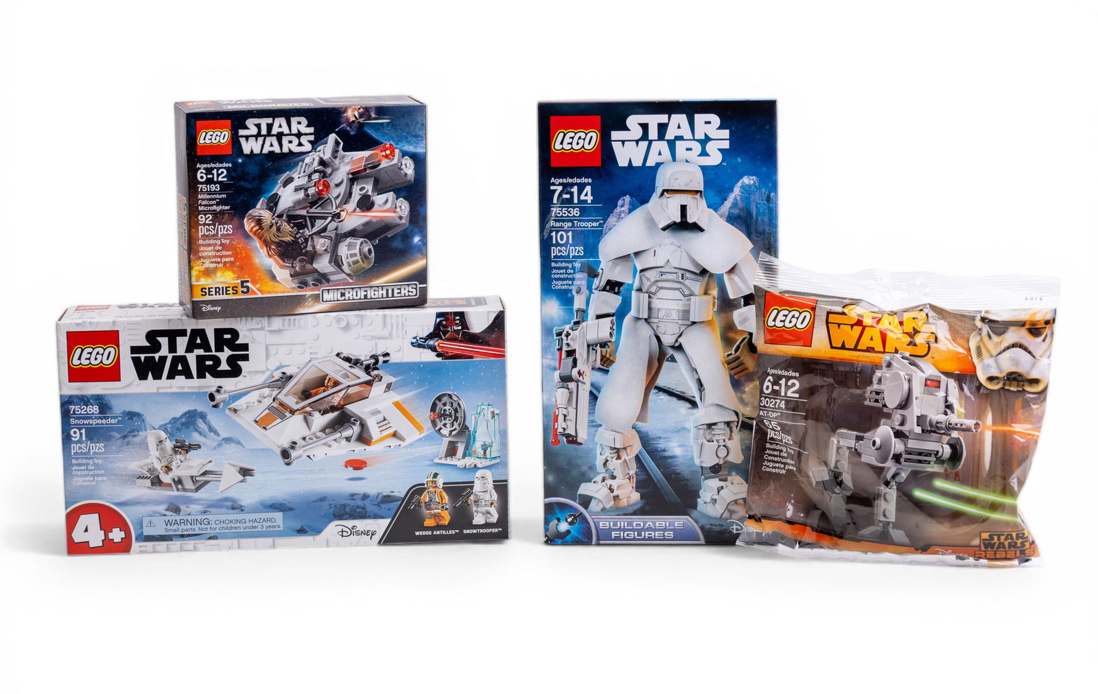 LEGO Star Wars NIB Lot with 4 Sets: Four NIB (new in box) LEGO Star Wars sets, including 75536 Range Trooper (101 pieces), 75193 Millennium Falcon Microfighter (92 pieces), 75268 Snowspeeder (91 pieces), and 30274 AT-DP polybag set (65