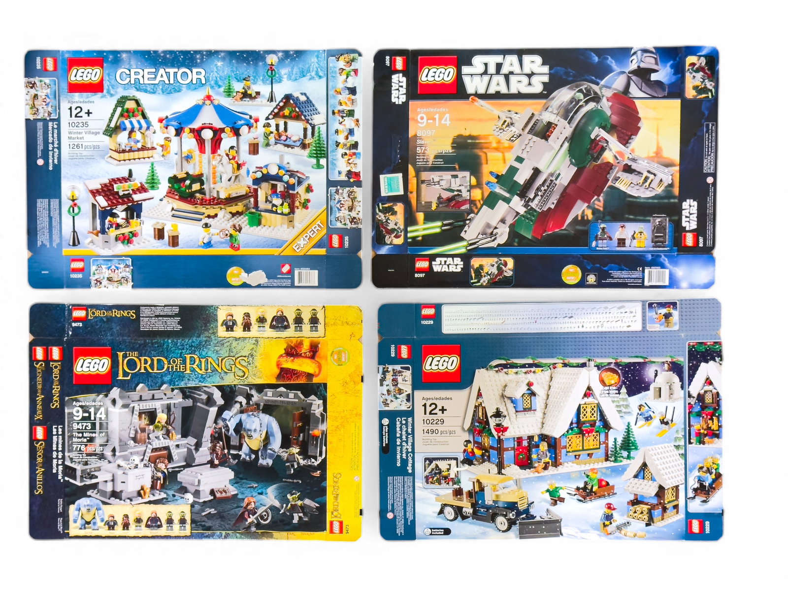 Flattened LEGO Boxes, Various Themes: Four flattened and empty LEGO boxes including 'Winter Village Cottage' (Set 10229), 'The Lord of the Rings: The Mines of Moria' (Set 9473), 'Star Wars Slave I' (Set 8097), and 'Winter Village Market'