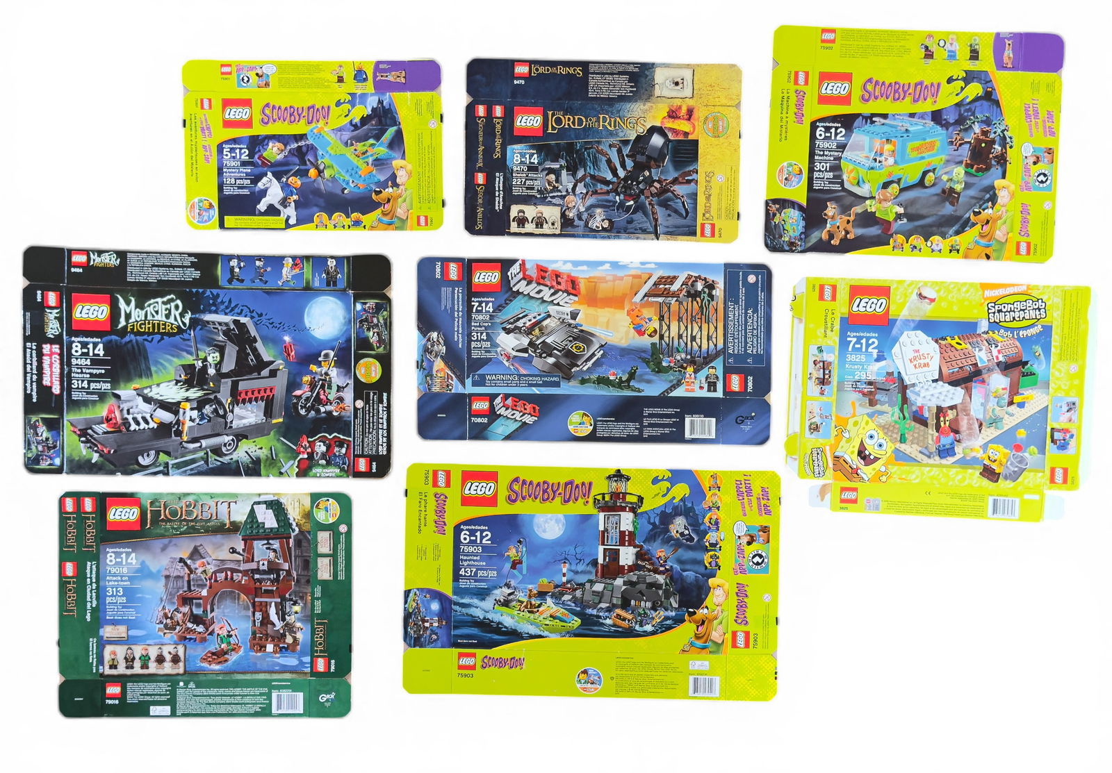 8 Flattened LEGO Boxes: Various Themes: 8 flattened, empty LEGO set boxes featuring themes such as Lord of the Rings (#9470), Scooby-Doo (#75901, #75902, #75903), The Hobbit (#79016), SpongeBob SquarePants (#3825), The LEGO Movie (#70802),
