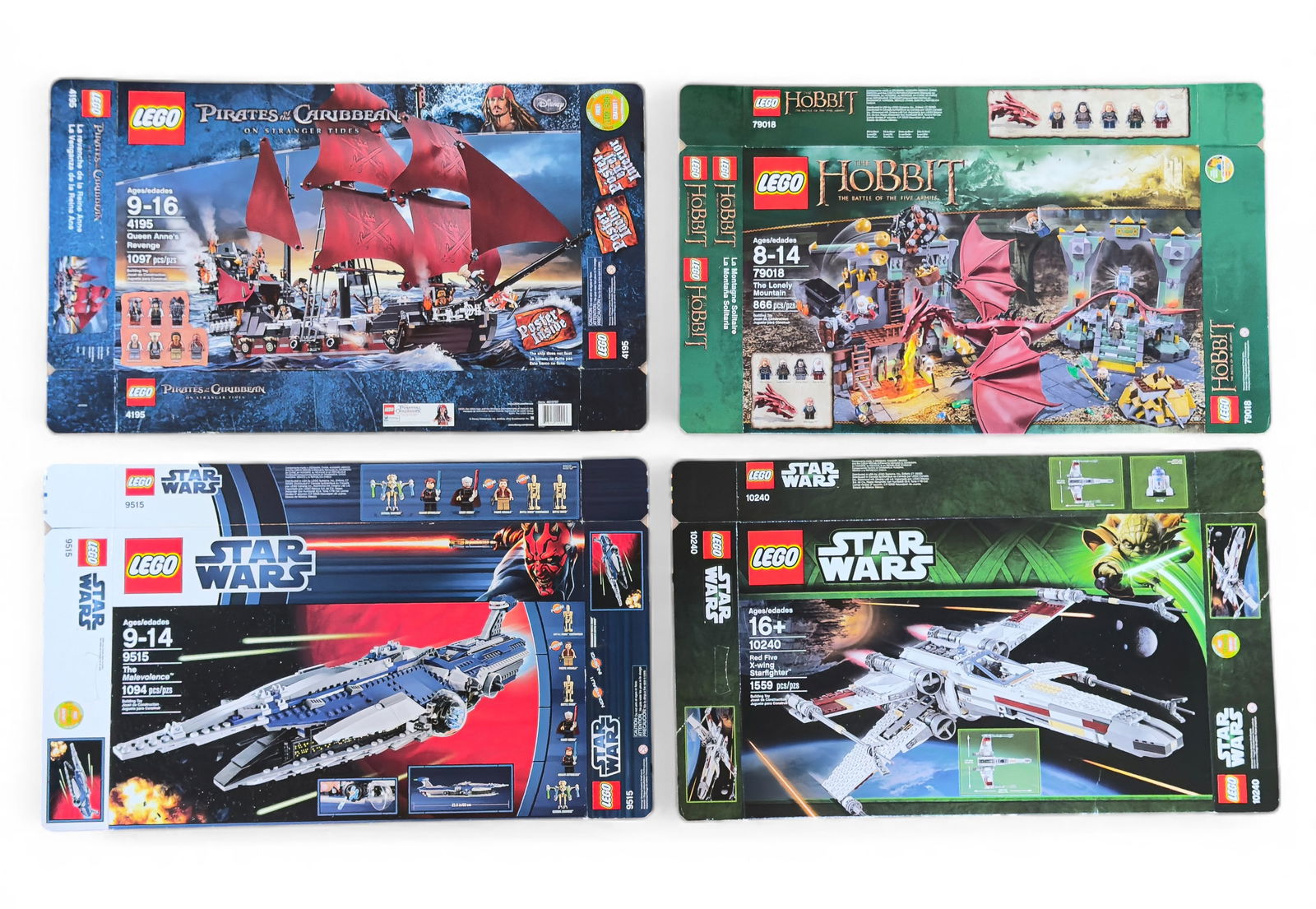 Four Empty LEGO Boxes (Pirates, Hobbit, Star Wars): Empty LEGO packaging for four sets. Includes set #4195 Queen Anne's Revenge (Pirates of the Caribbean, 1097 pcs), set #79018 The Lonely Mountain (The Hobbit, 866 pcs), set #9515 The Malevolence (Star