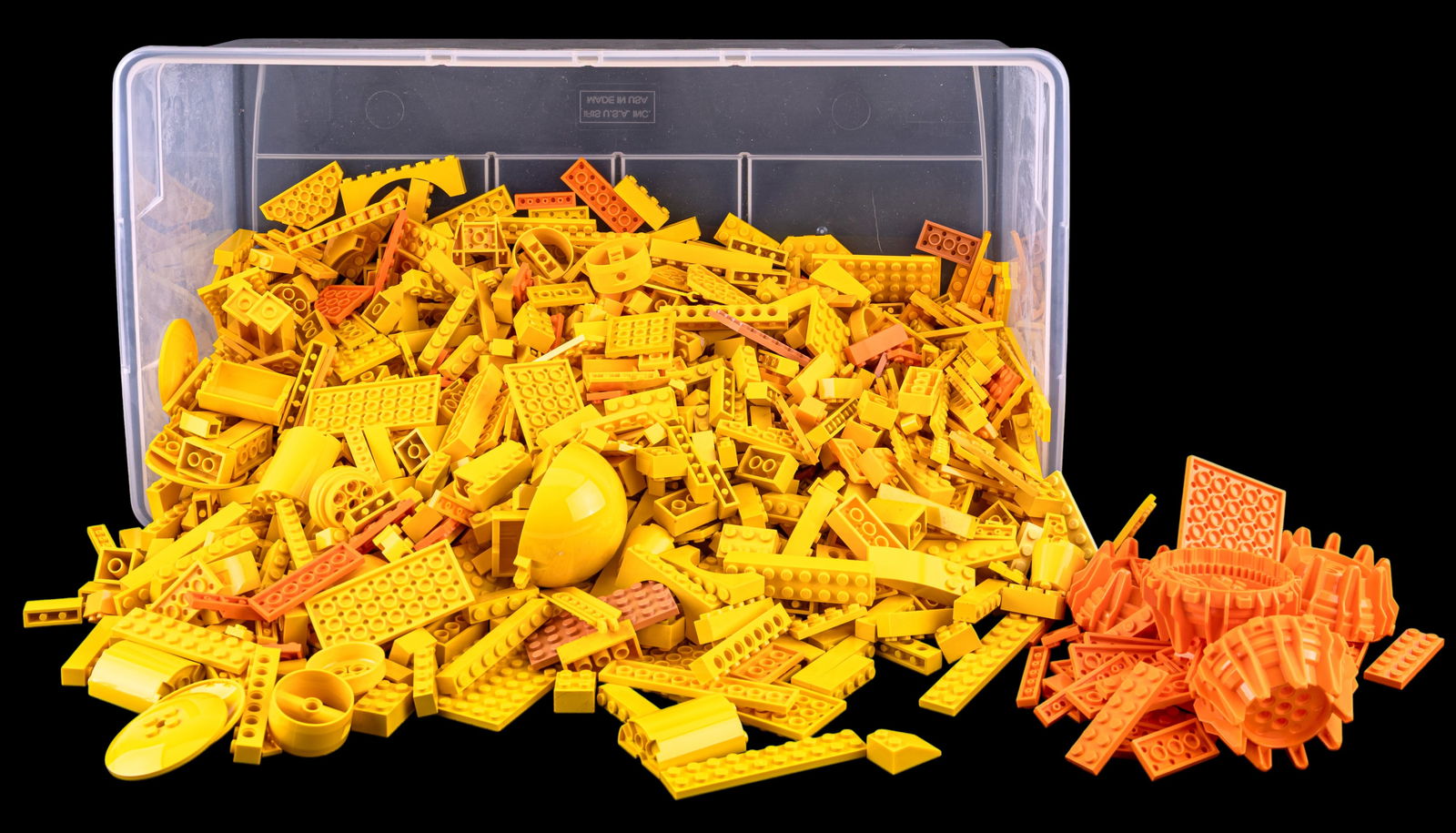Approximately 6 Pounds of Yellow and Orange LEGO: Approximately 6 pounds of assorted LEGO bricks, mostly yellow with some orange pieces included. Includes a variety of shapes and sizes, including larger plates and curved elements. Items are contained