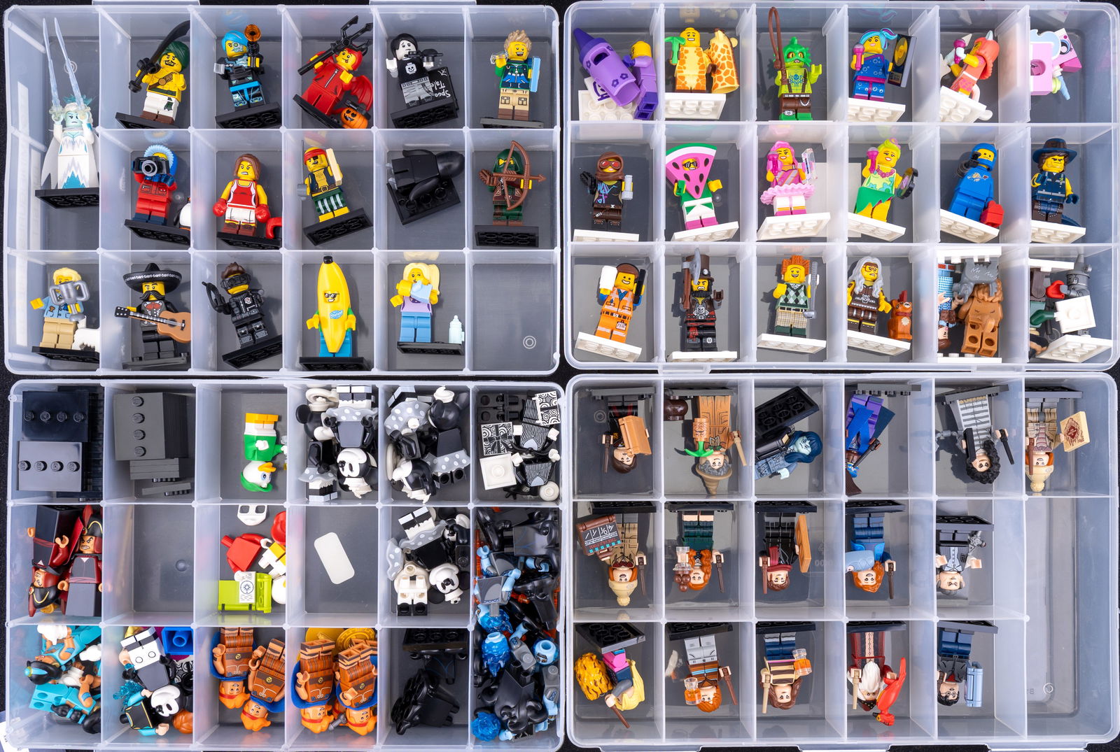 LEGO Minifigures in 4 Containers: Four containers of LEGO minifigures organized by series and themes, including Series 16 Full Set, Disney Series 2 Extras, and other assorted collections. Containers display compartmentalized storage,