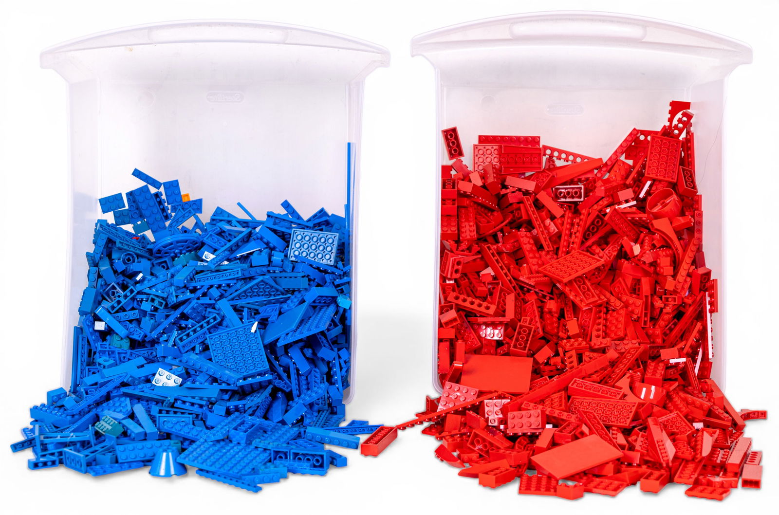 Approximately 11 lbs of Assorted LEGO Bricks: Bulk lot of approximately 11 lbs of LEGO bricks in two main colors: blue and red. Includes assorted shapes, sizes, and types of LEGO pieces, suitable for building and creative projects.