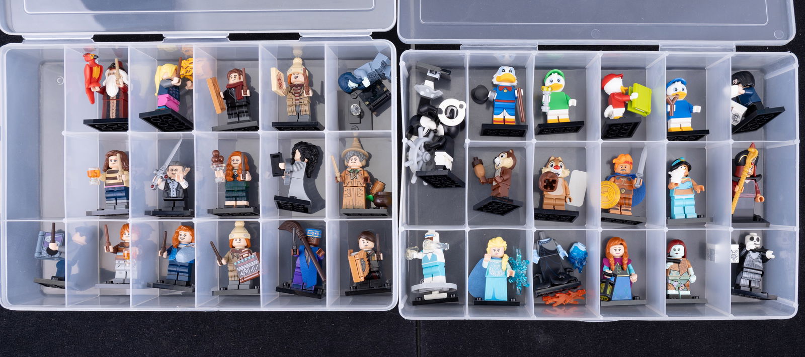 Lego Minifigures in Organized Containers: Second lot of two storage containers of Lego minifigures, each with individual compartments. The first container appears to feature a complete set of Disney Series 2 minifigures. The second includes a