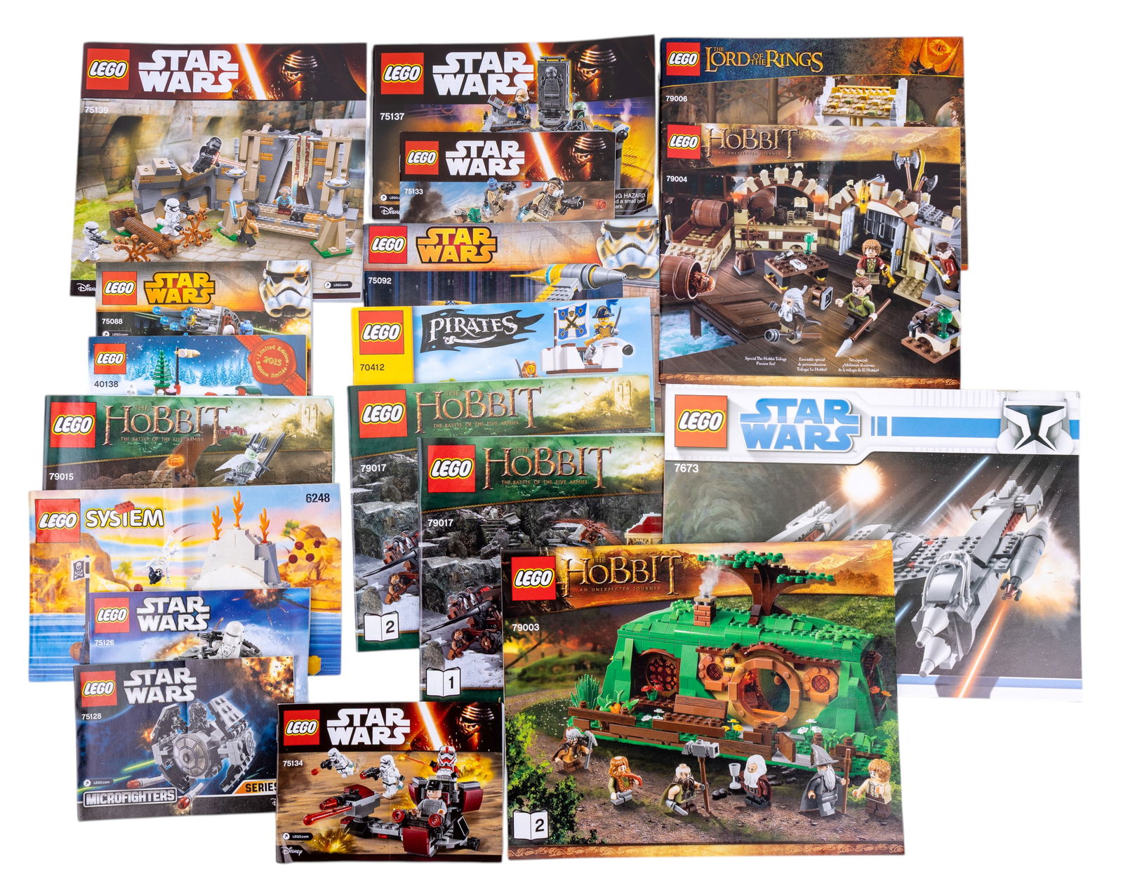 LEGO Instruction Booklets: LEGO instruction booklets featuring various themes including The Hobbit, Star Wars, Pirates, LEGO System, and more. Titles include sets like The Hobbit 79010 and Star Wars 75137; additional sets are i