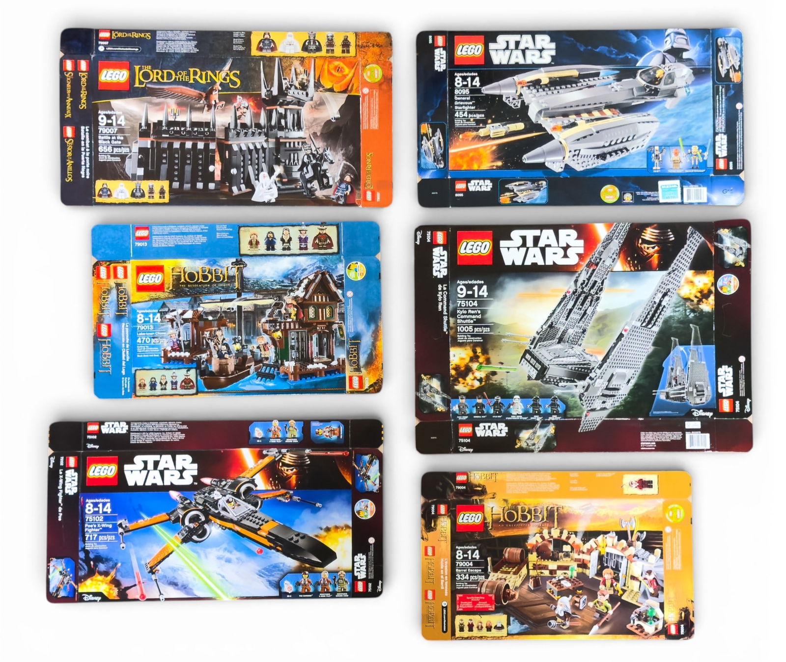 6 Flattened LEGO Set Boxes: Six flattened LEGO set boxes, including boxes for Star Wars, The Hobbit, and Lord of the Rings themes. No LEGO pieces or other components included, with only the original empty boxes provided.