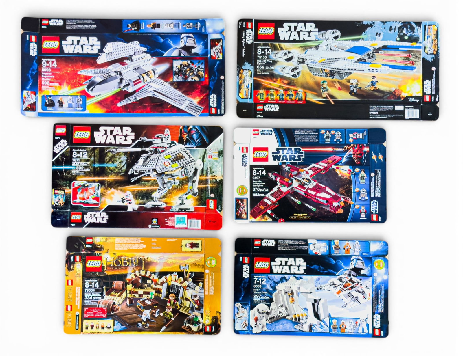 6 Flattened LEGO Boxes: Star Wars and The Hobbit: Six flattened LEGO boxes featuring Star Wars and The Hobbit themes. Includes Star Wars sets 8096, 75155, 7671, 9497, and 7126, as well as The Hobbit set 79004. No LEGO bricks or pieces included, only