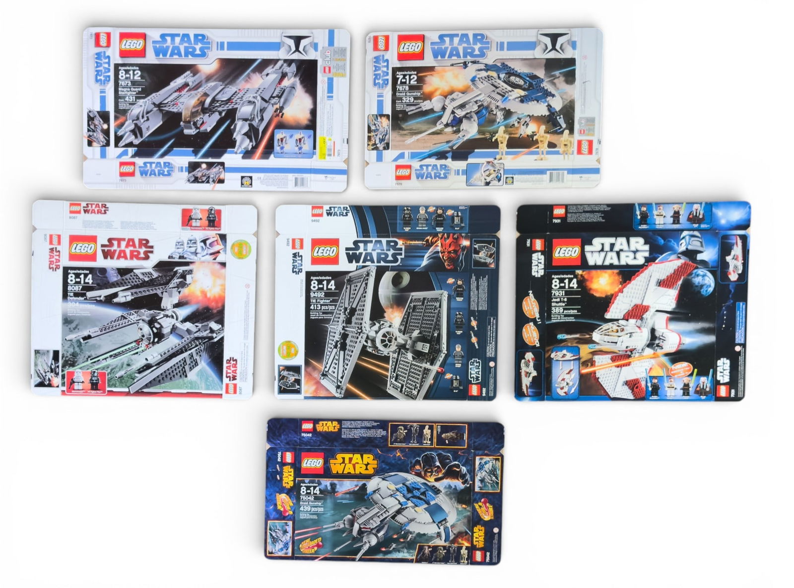 LEGO Star Wars Flattened Boxes (6 Total): Six flattened LEGO Star Wars boxes: 75042 Droid Gunship, 7931 Jedi T-6 Shuttle, 8087 TIE Defender, 7678 Droid Gunship, 9492 TIE Fighter, and 7673 MagnaGuard Starfighter. Boxes only; no LEGO pieces or