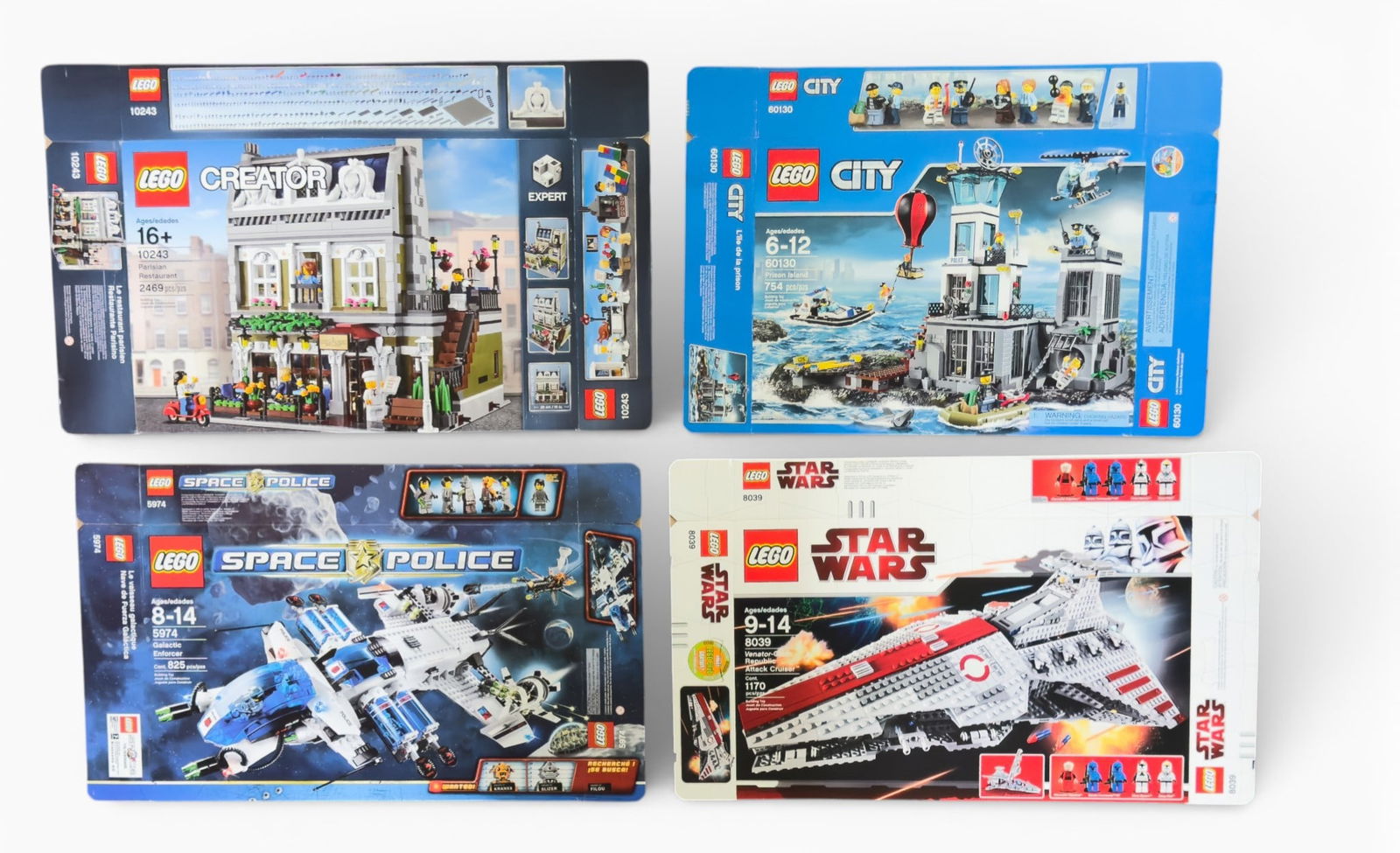 4 LEGO Boxes (No Contents Included): 4 empty Lego boxes. Included are LEGO Star Wars 8039 Republic Attack Cruiser, LEGO Space Police 5974 Galactic Enforcer, LEGO City 60130 Prison Island, and LEGO Creator Expert 10243 Parisian