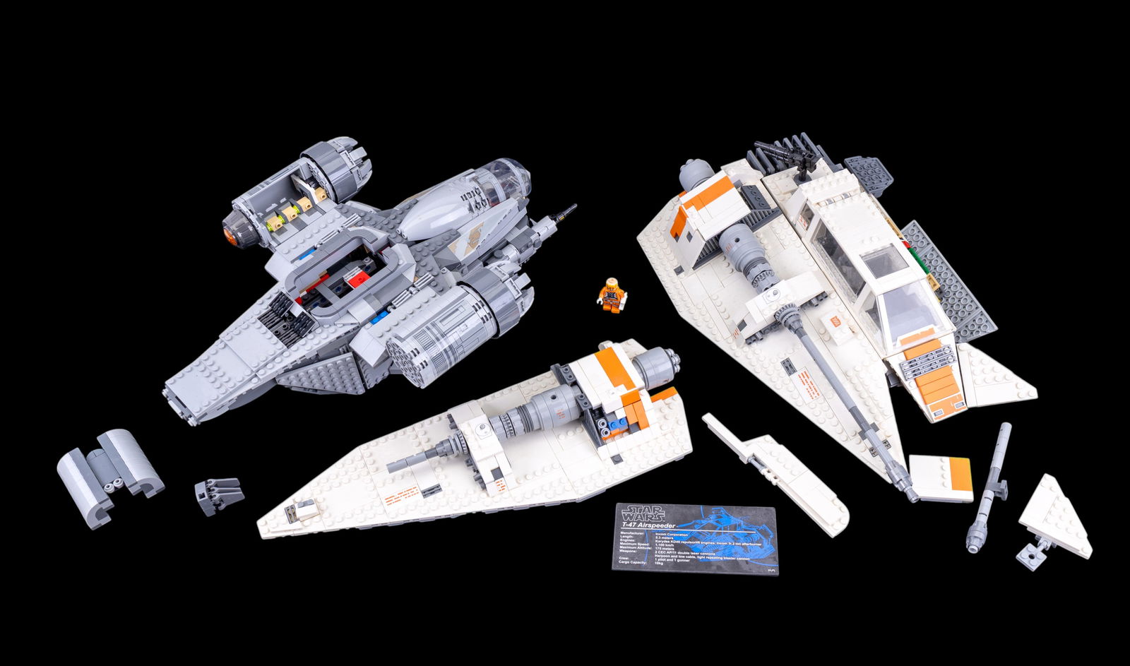 2 Incomplete LEGO Builds: Two incomplete LEGO builds sold as found. One build appears to resemble a gray spacecraft with visible cockpit details and engine components. The second build has beige and orange elements with