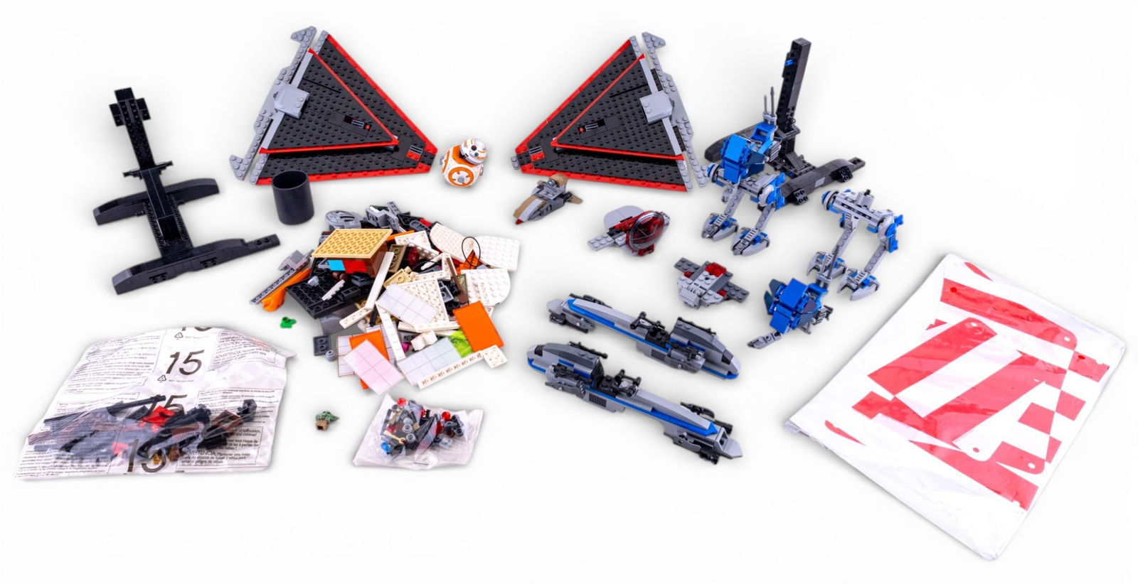 Two Incomplete Sets of LEGO Pieces: Two incomplete sets of LEGO pieces, including various bricks, structural elements, and printed pieces. Pieces sold as found. No manuals/booklets.
