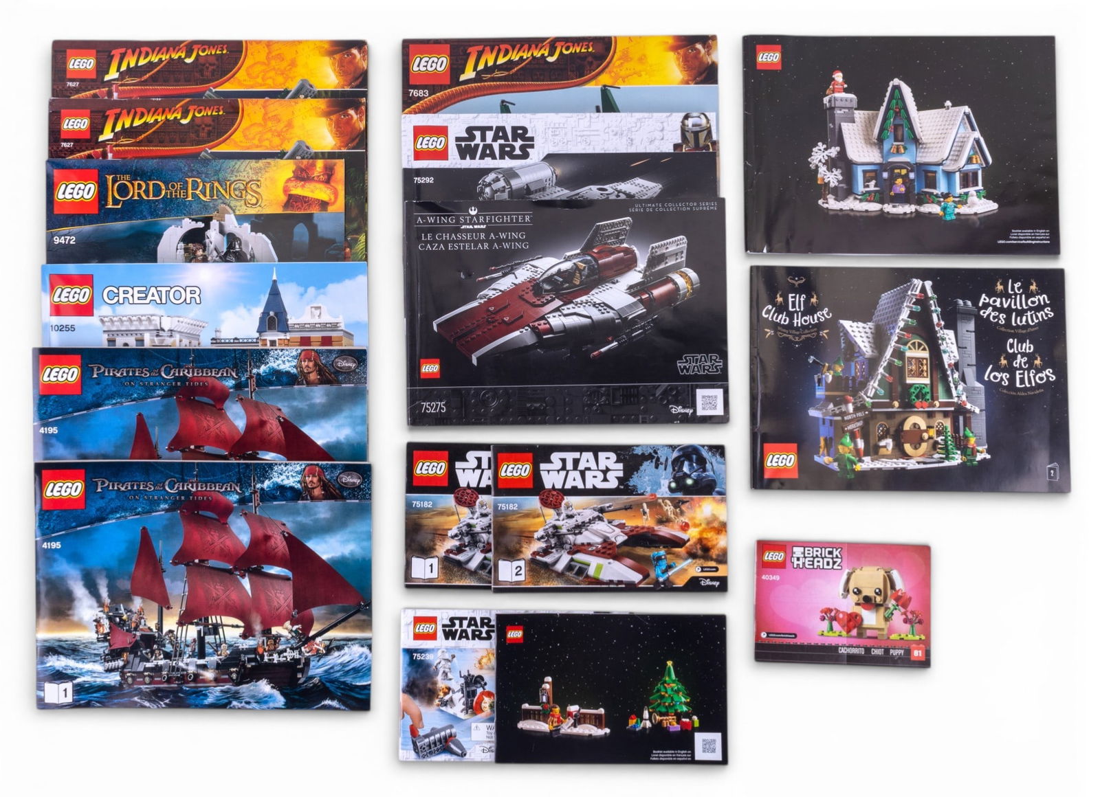 LEGO Instruction Booklets: LEGO instruction booklets featuring themes such as LEGO Ninjago City, LEGO Architecture (set 21047), LEGO Creator Expert (Downtown Diner, set 10260), and multiple LEGO Star Wars sets (e.g., 75202 and