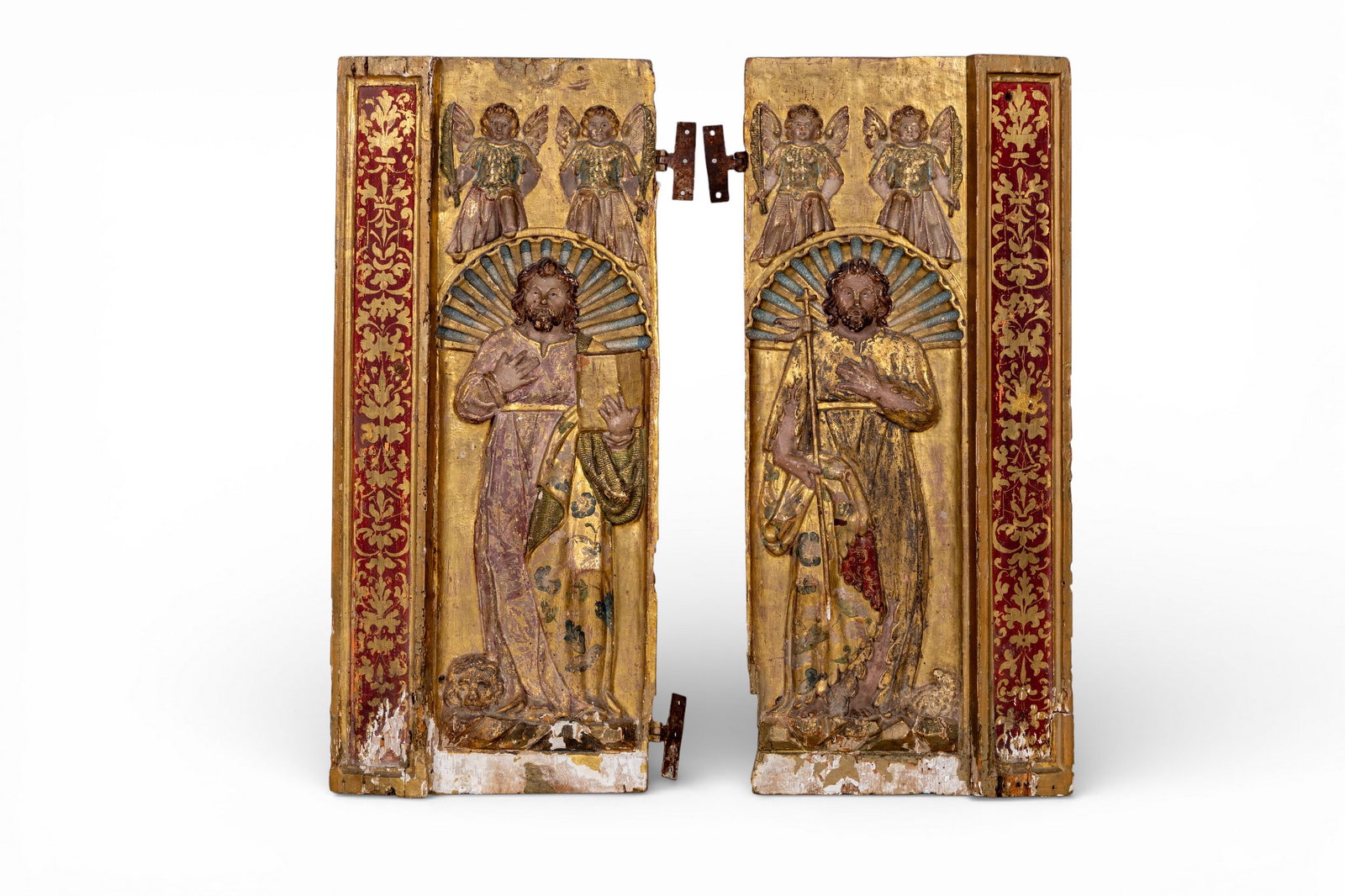 18th C Carved Painted Religious Door Panels: A pair of hand painted, gessoed, and carved 18th C wooden door panels depicting Jesus and angels on the front, the reverse of one panel is a blue and gold design and the reverse on the other panel