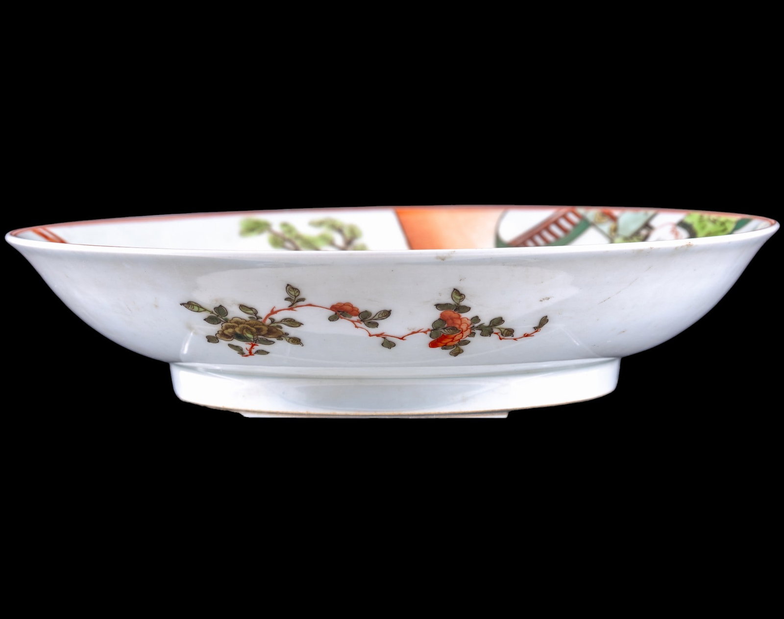 Chinese Porcelain Plate with Six-Character Mark: Chinese porcelain plate with colorful polychrome hand-painted decoration depicting a figural scene involving children outdoors. The underside bears a six-character mark within a double blue ring.
