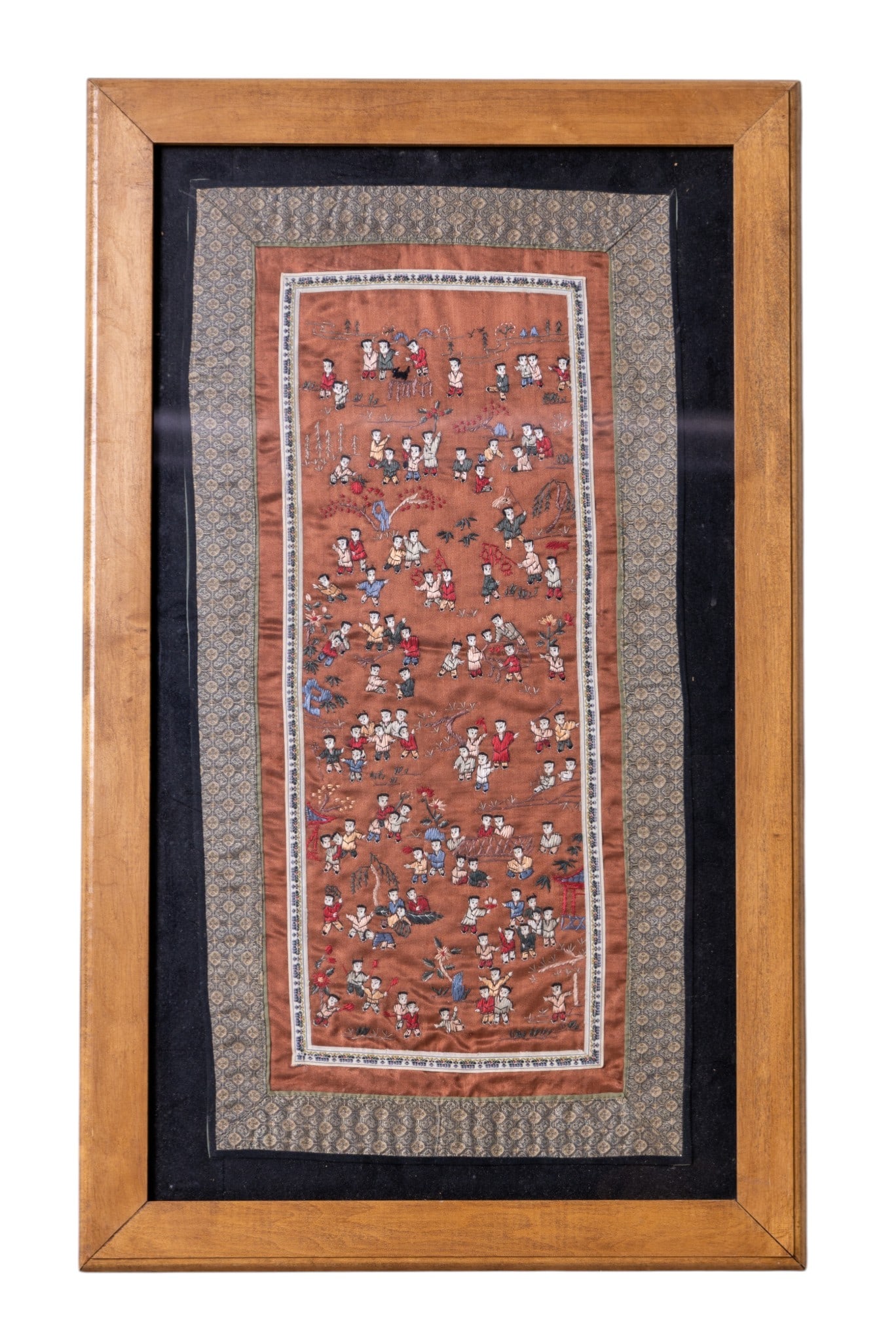 Chinese Silk Embroidery "100 Children": Framed Chinese silk embroidery panel depicting numerous children engaged in various activities within a stylized setting. Measures approx. 31" x 18.5" OD.