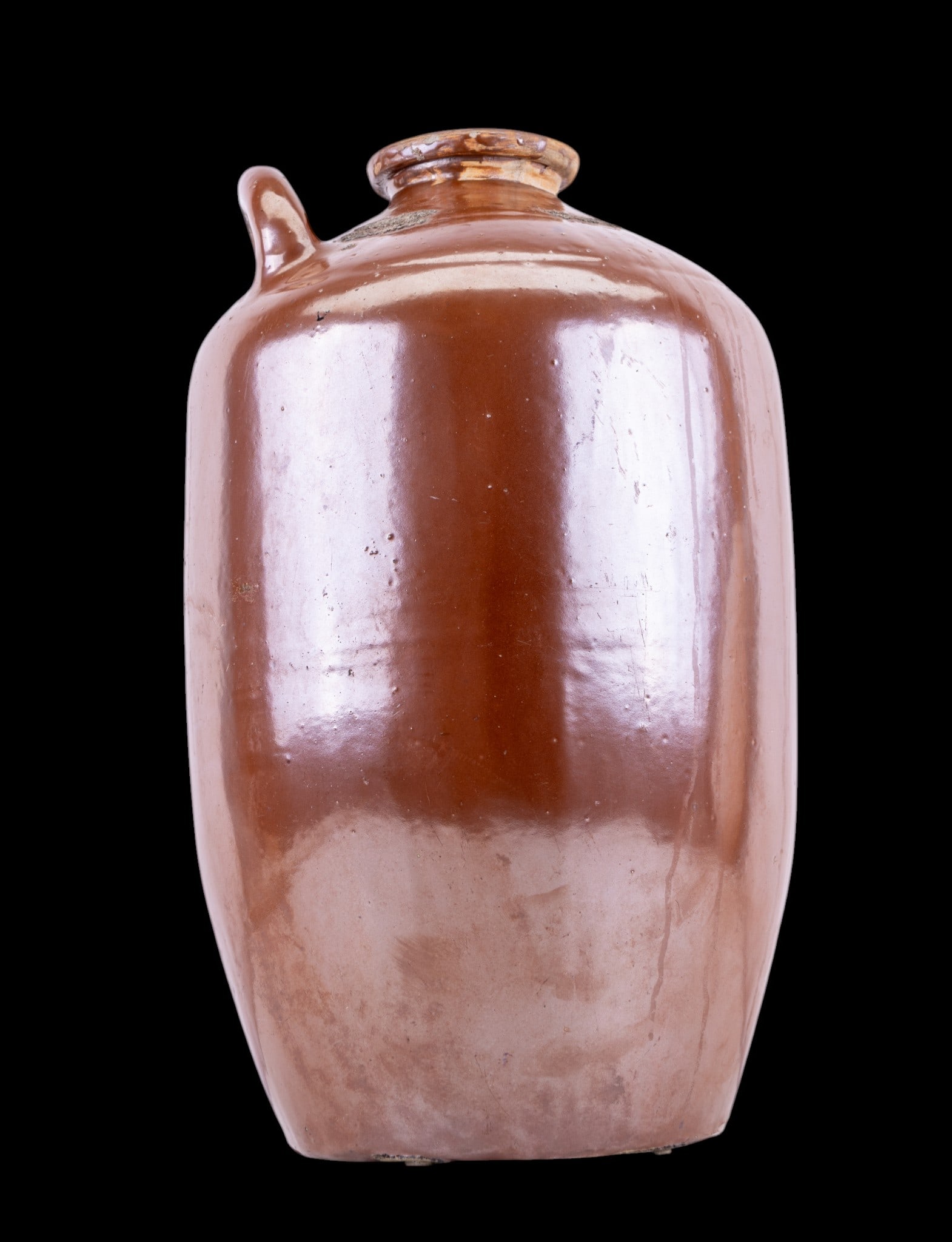 19th/20th C European Large Stoneware Water Jug: A late 19th or early 20th century large European stoneware water jug measuring approx. 21" high x 13.5" diameter. Chips and wear can be found on top side of jar.