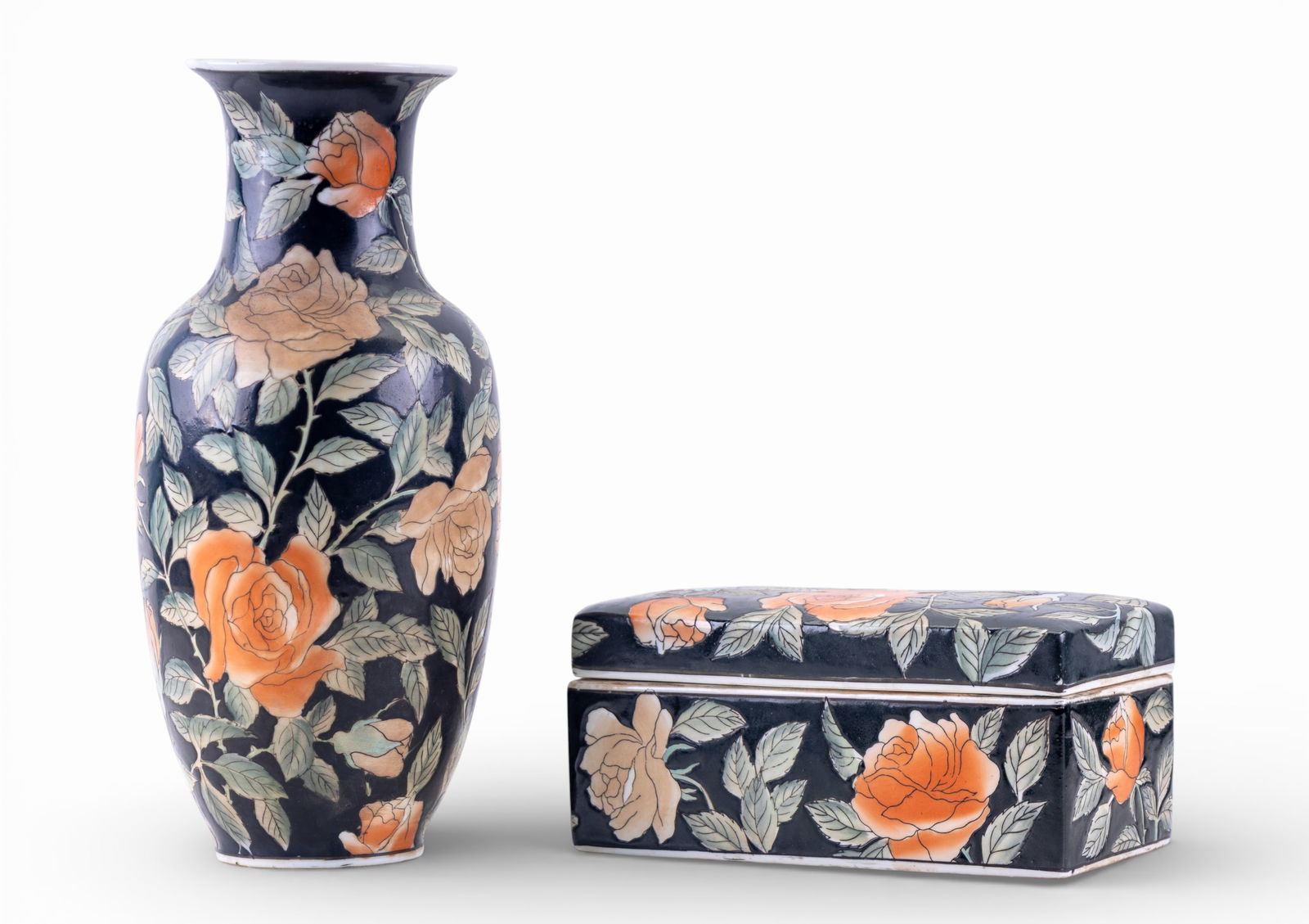 Chinese Porcelain Floral Vase & Matching Box: Lot includes a Chinese porcelain vase and matching rectangular lidded box, each decorated with hand-painted floral motifs in orange, cream, blue, and green against a black ground. Each piece marked
