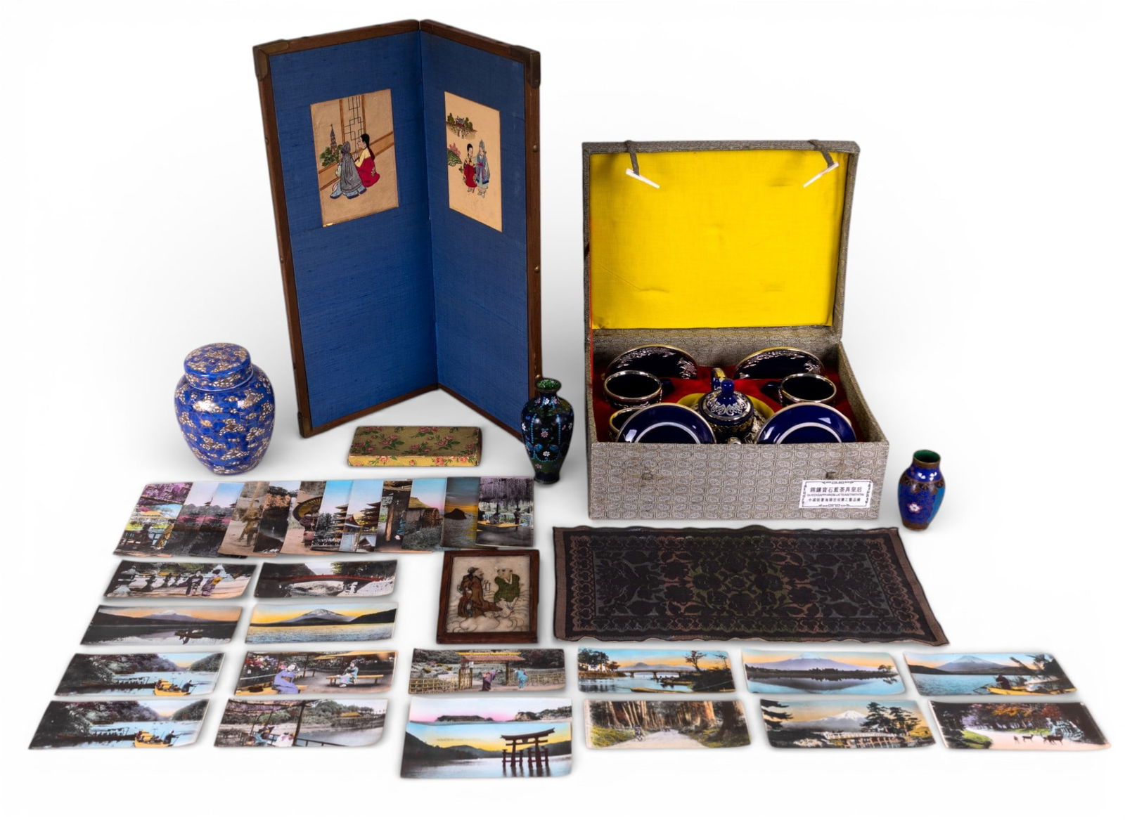 Contemporary Asian Porcelain and Textiles: A collection of contemporary Asian porcelain and textiles including a small Korean silk screen panel depicting women by a window, each panel measures approx. 19.25" H x 8" W, blue, white, and gold